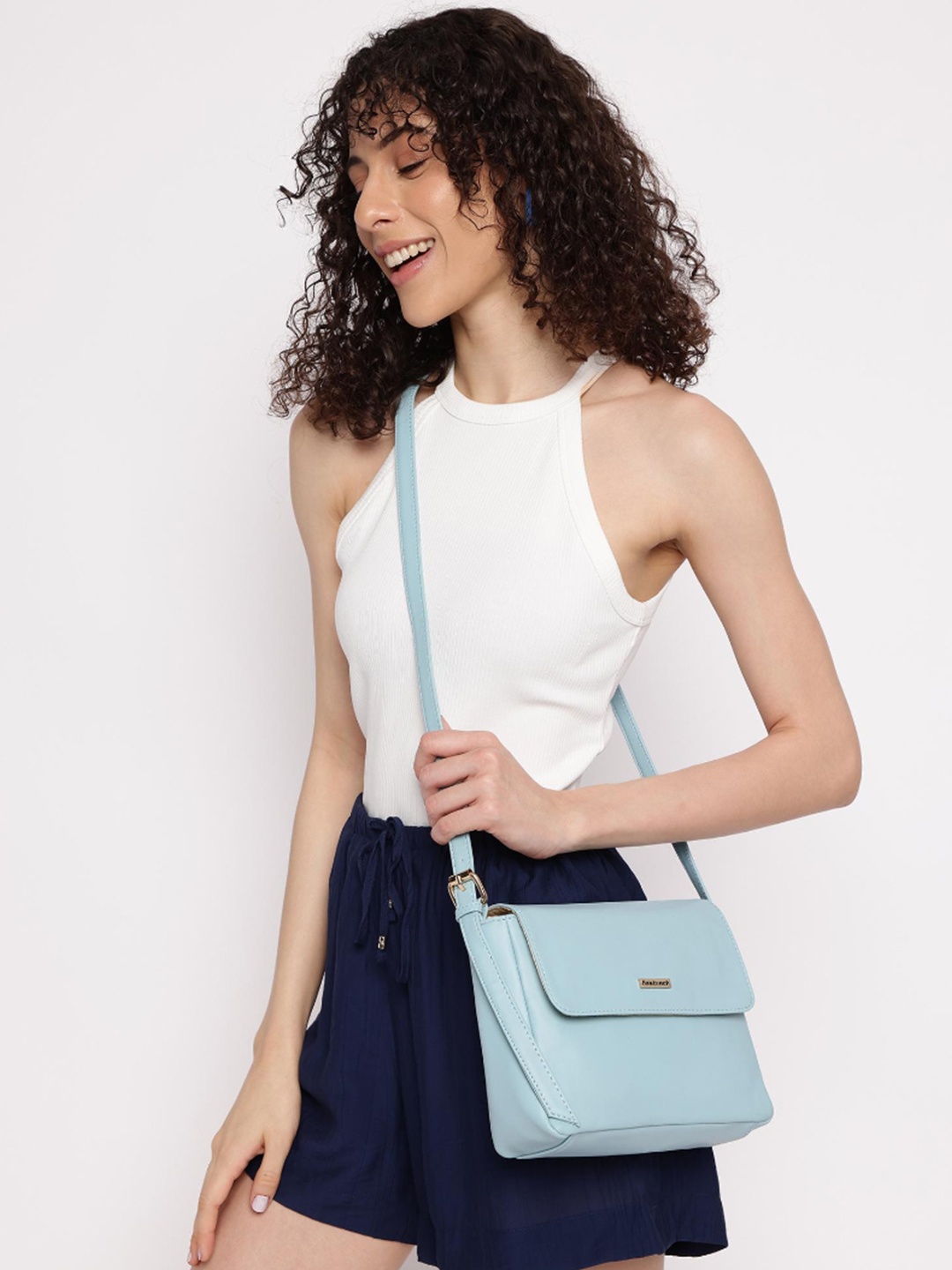 

Fastrack Blue PU Structured Sling Bag