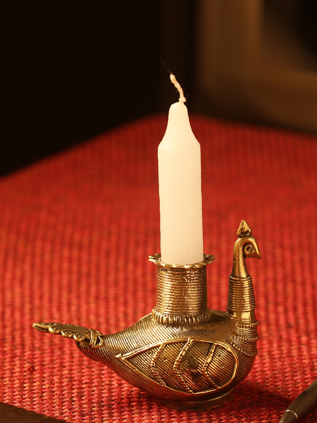 

ExclusiveLane Gold-Toned Glowing Peacock Handmade Candle Holder In Dhokra Art