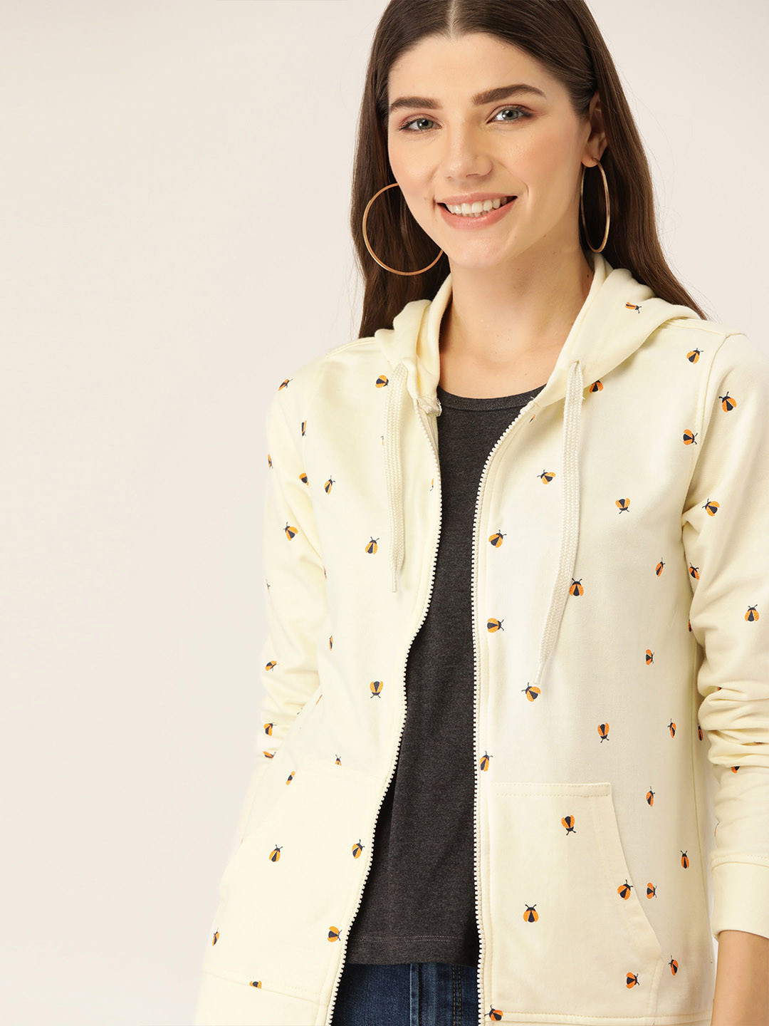 

DressBerry Women Cream-Coloured & Black Bug Printed Hooded Sweatshirt