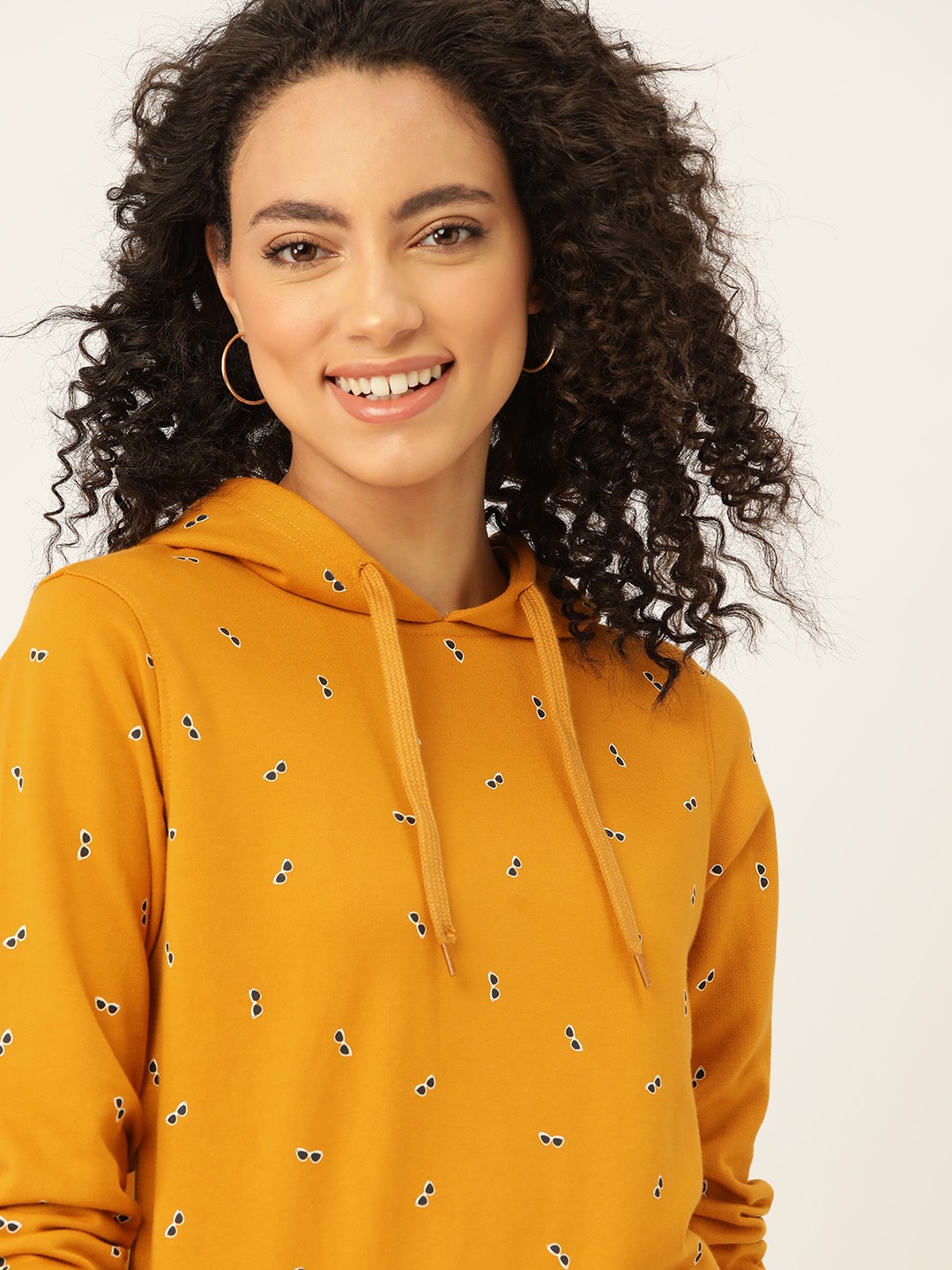 

DressBerry Women Mustard Yellow & Black Printed Hooded Sweatshirt