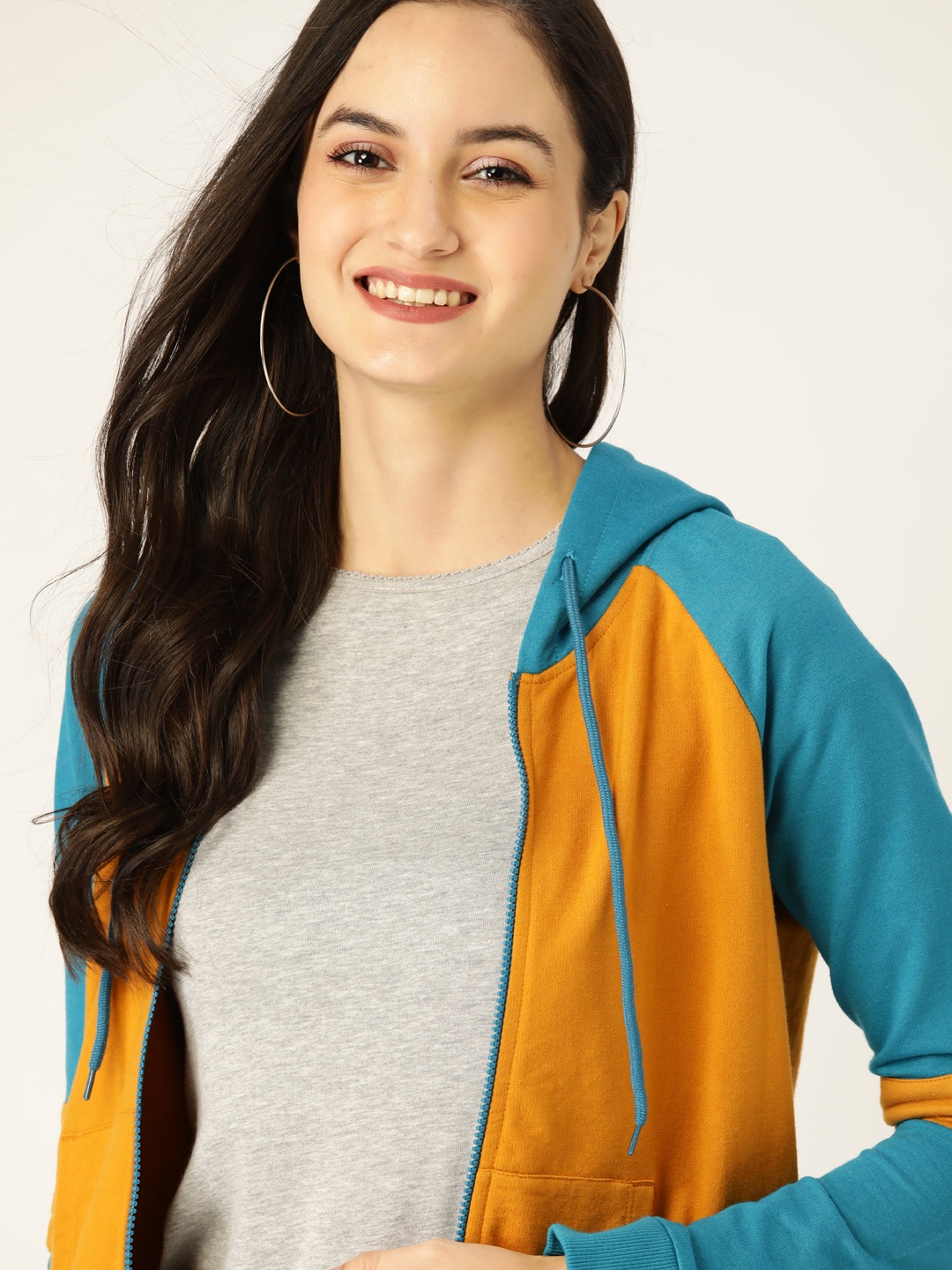 

DressBerry Women Mustard Yellow & Blue Solid Hooded Sweatshirt