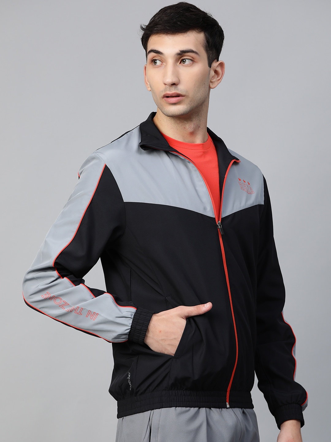 

HRX by Hrithik Roshan Men Black/Foggy Grey/Orange Colourblocked Rapid-Dry Antimicrobial Football Jacket