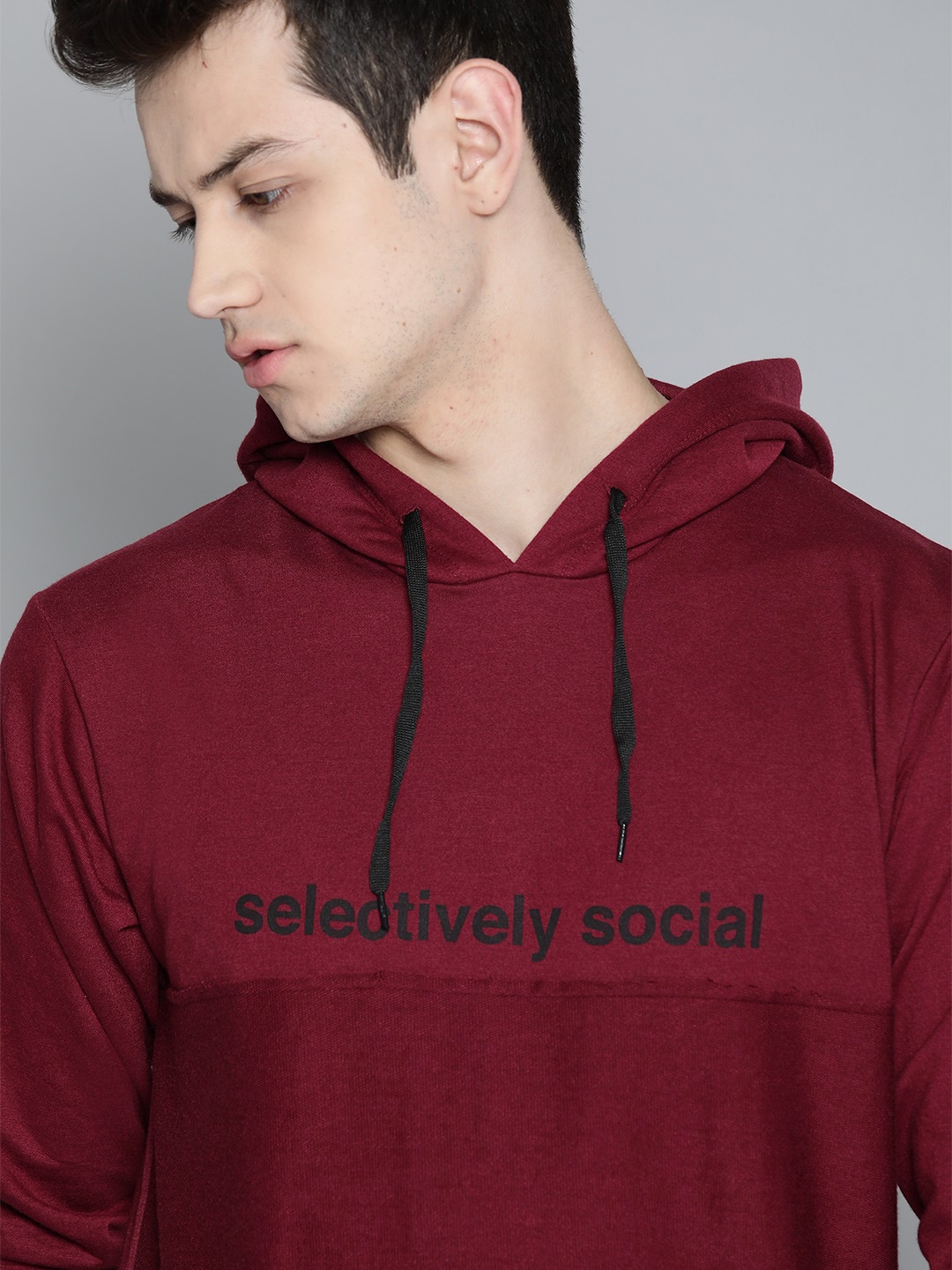 

Kook N Keech Men Maroon Solid Longline Hooded Sweatshirt