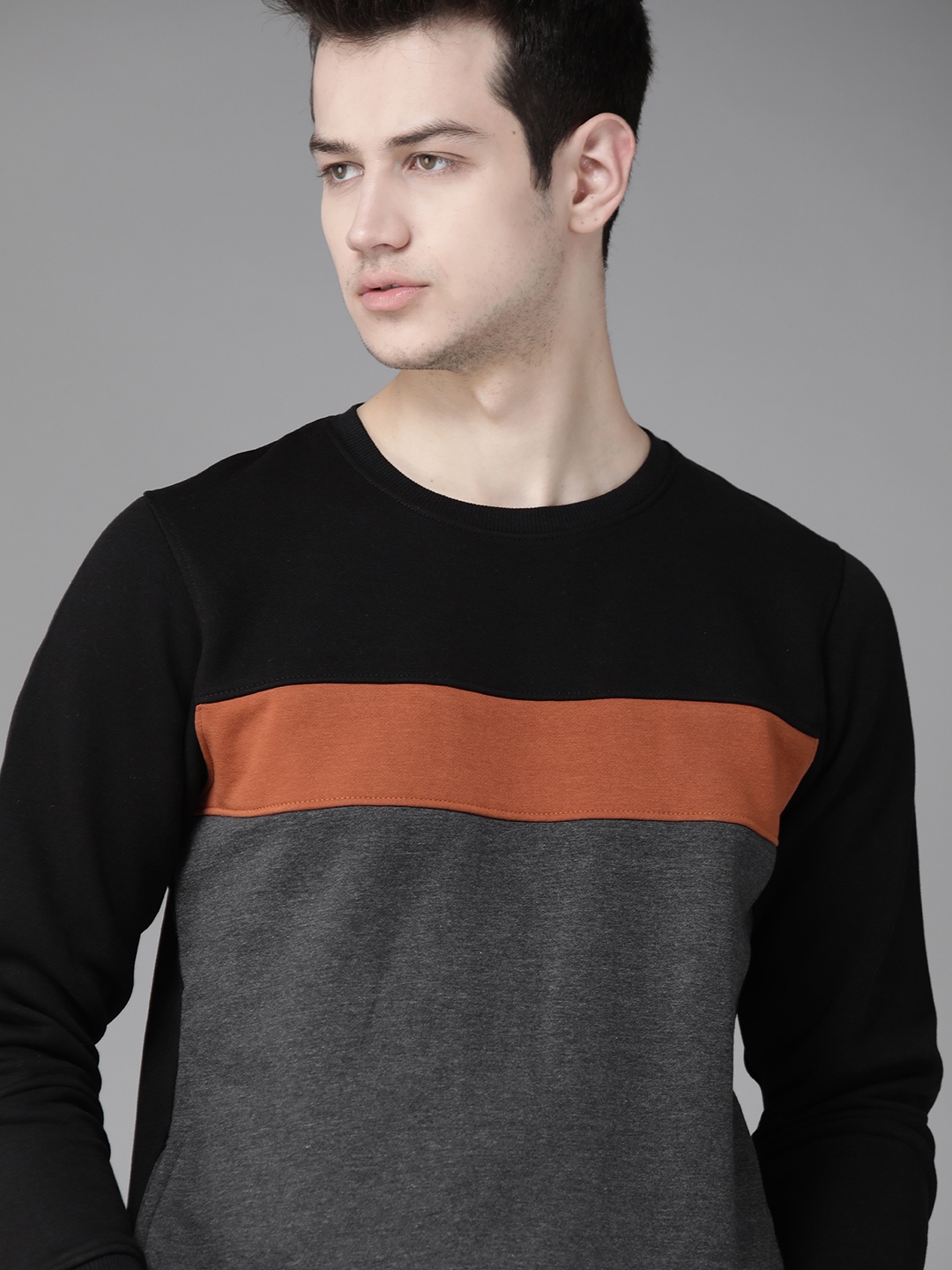 

Roadster Men Charcoal Grey & Black Striped Sweatshirt