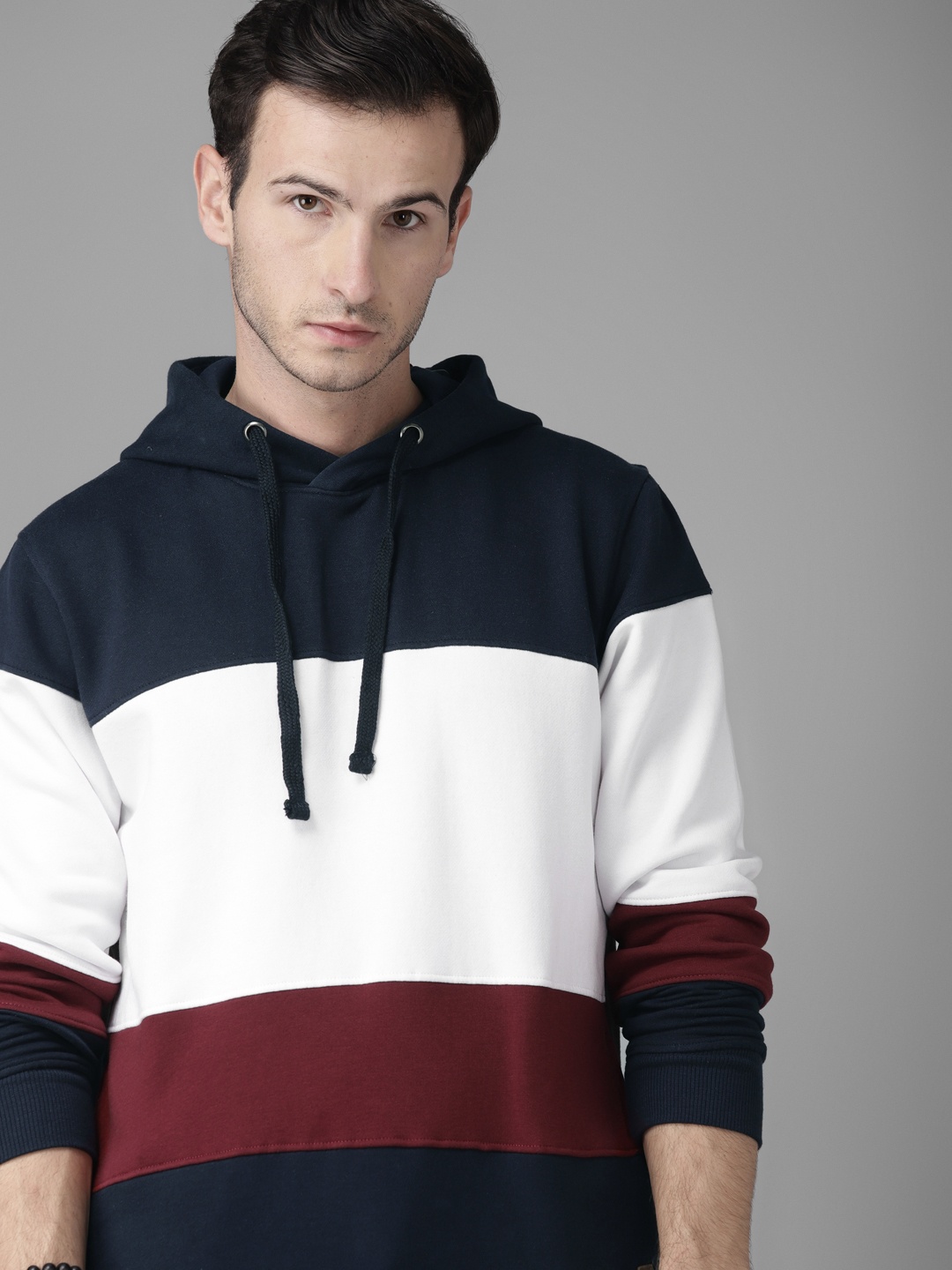 

Roadster Men Navy Blue & White Colourblocked Hooded Sweatshirt