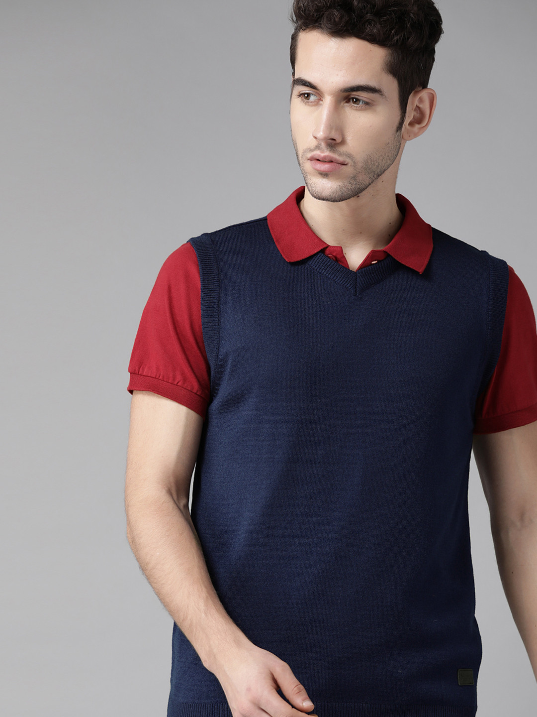 

Roadster Men Navy Blue Solid Sweater Vest