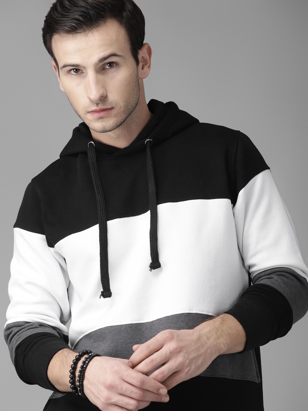 

Roadster Men Black & White Colourblocked Hooded Sweatshirt
