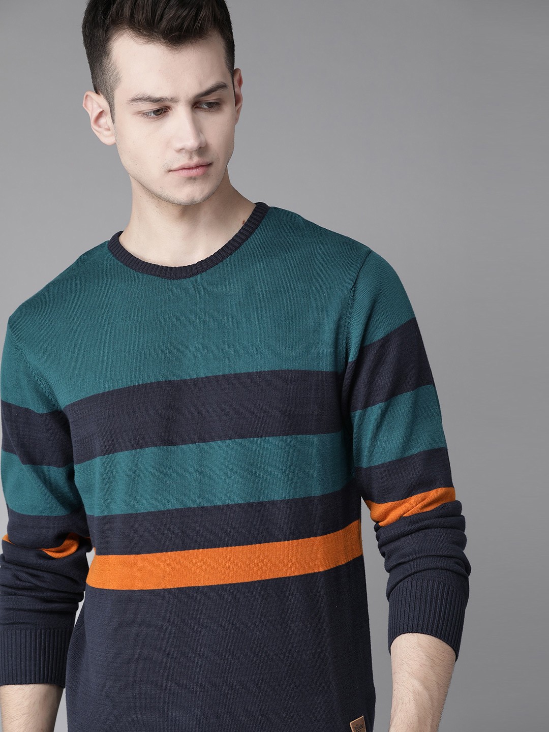 

Roadster Men Navy Blue & Teal Green Striped Pullover Sweater