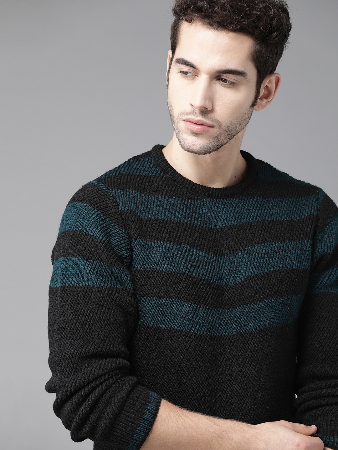 

Roadster Men Black & Teal Blue Striped Pullover Sweater