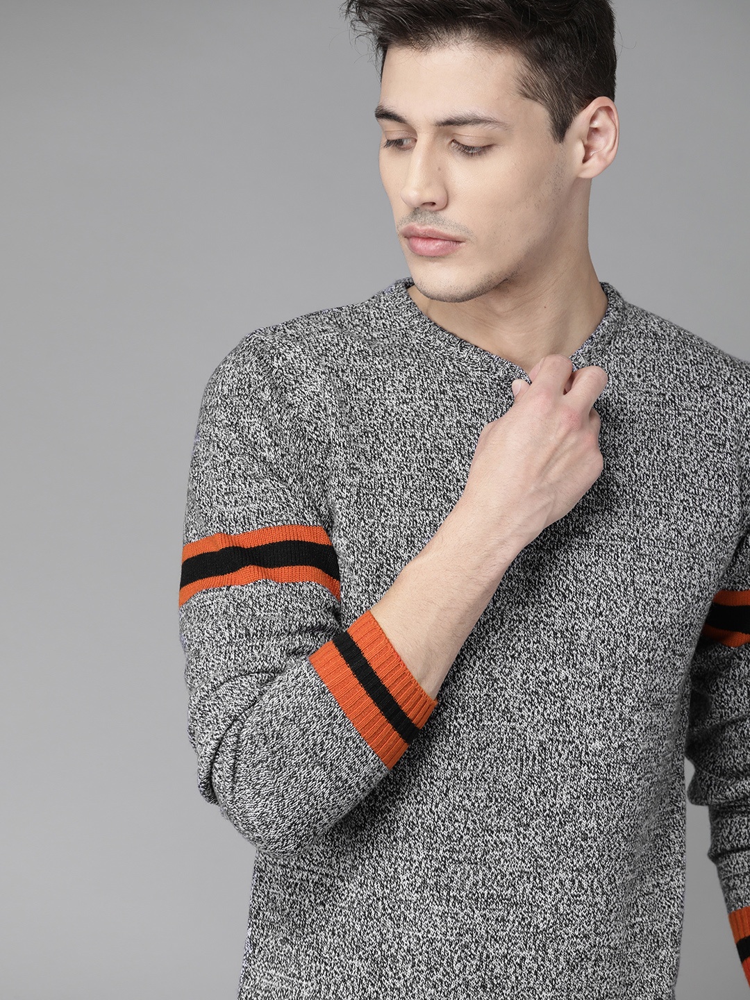 

Roadster Men Charcoal Grey & White Self Design Pullover Sweater