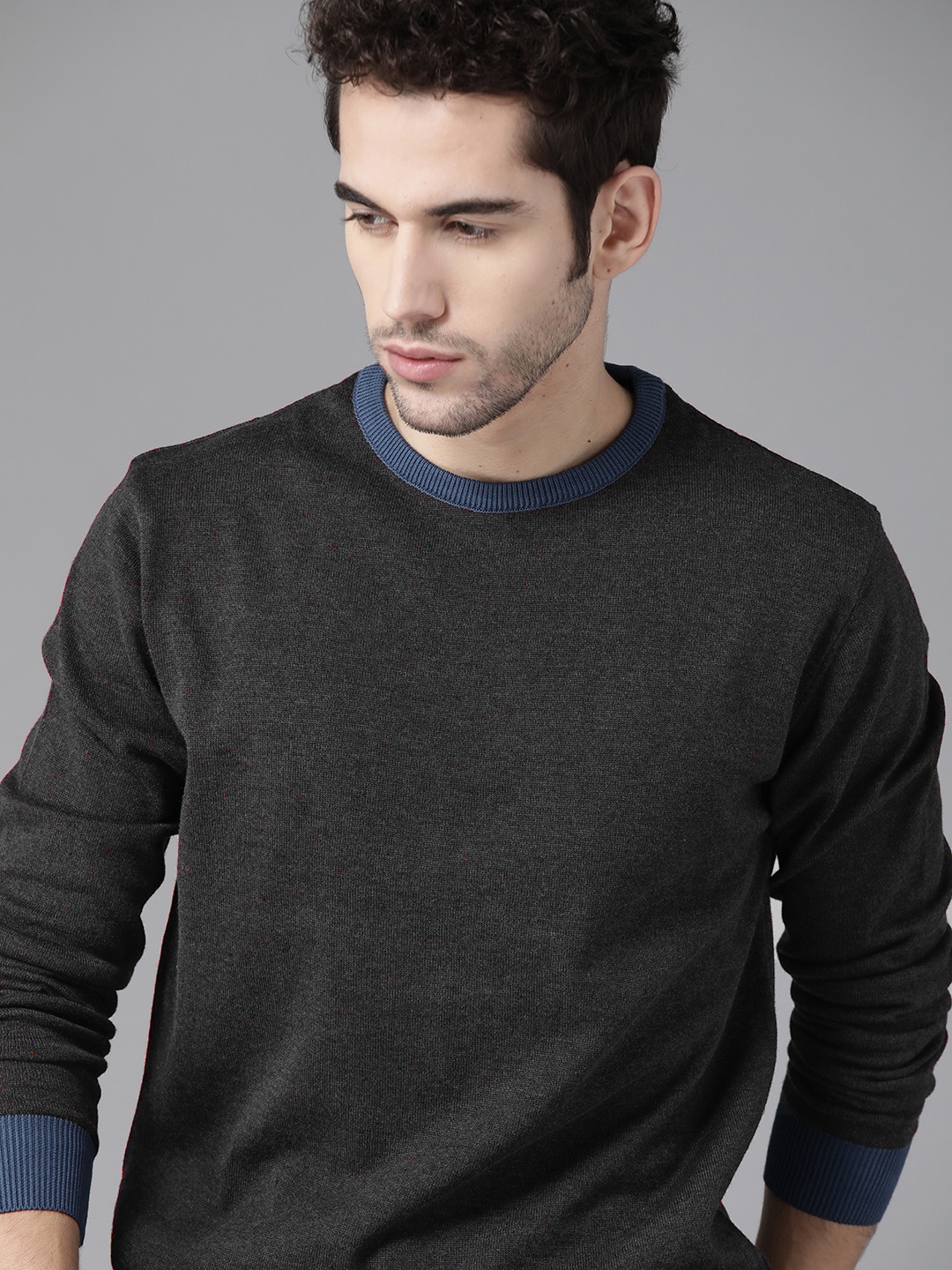 

Roadster Men Charcoal Grey Solid Pullover Sweater