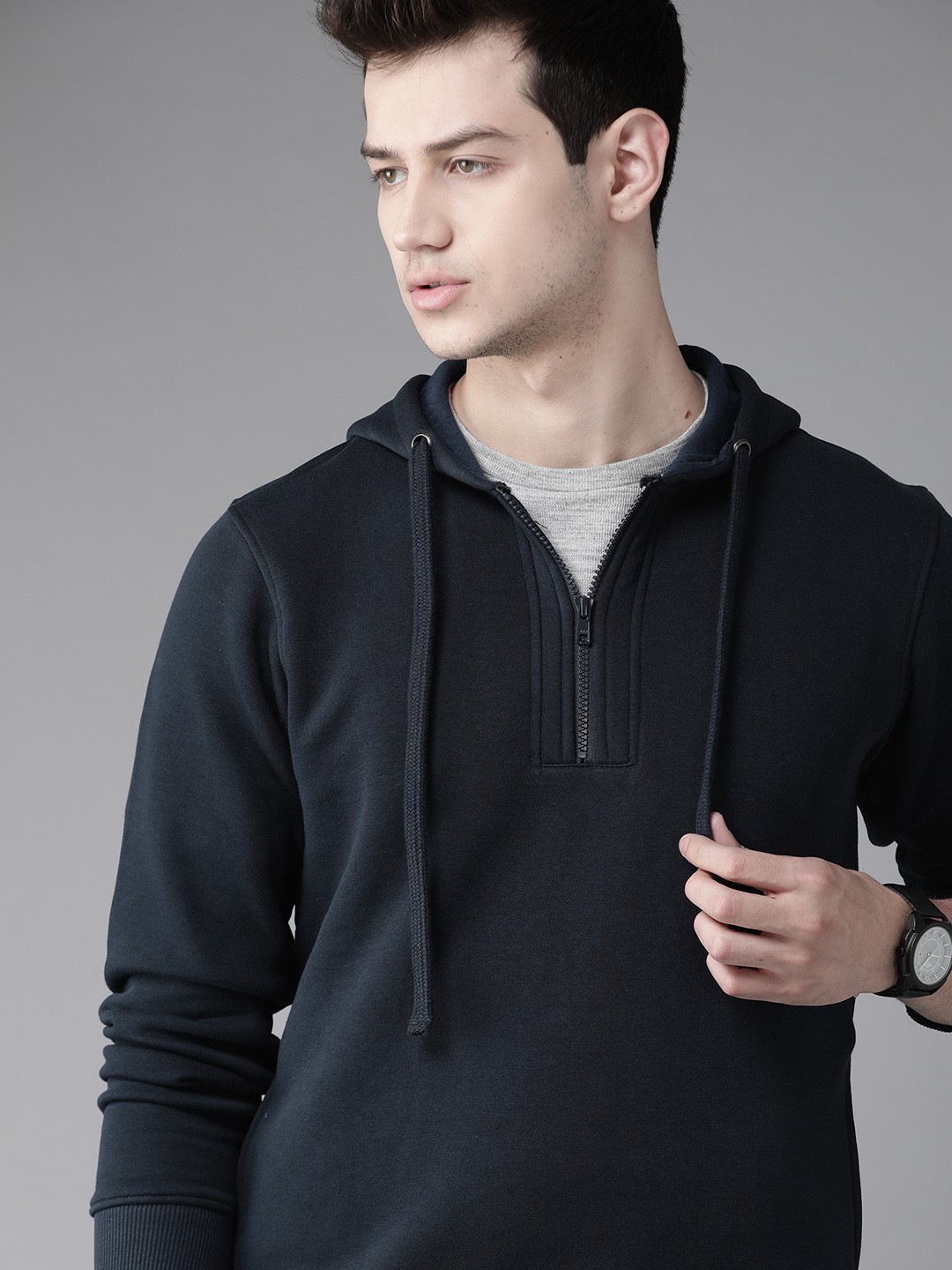 

Roadster Men Navy Blue Solid Hooded Sweatshirt