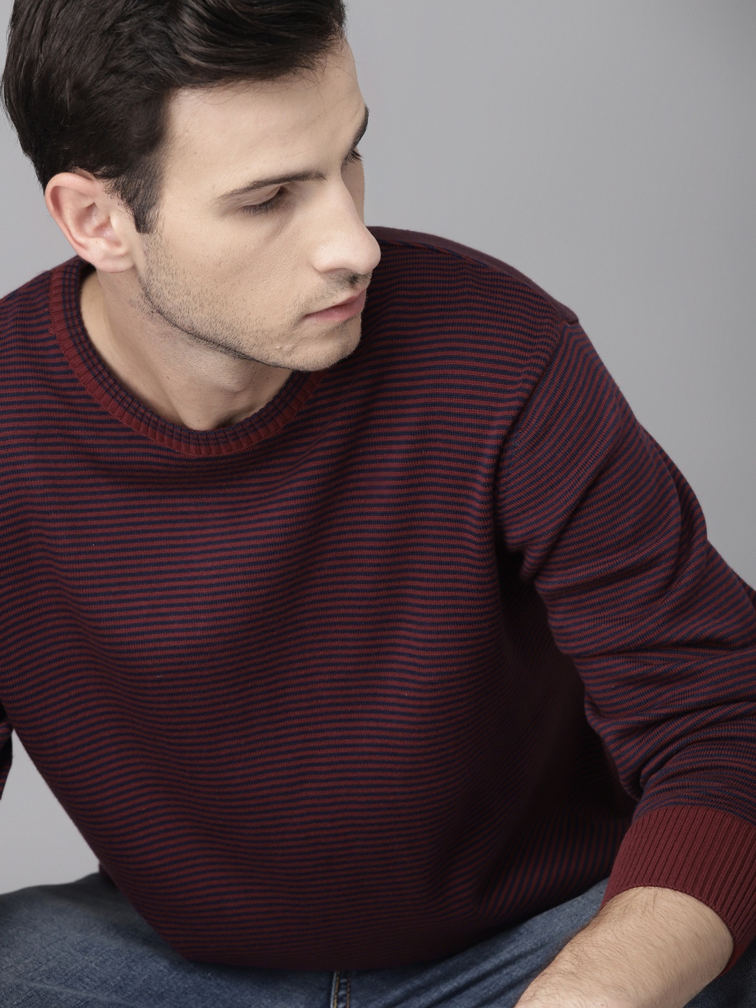

Roadster Men Maroon & Navy Blue Striped Pullover Sweater