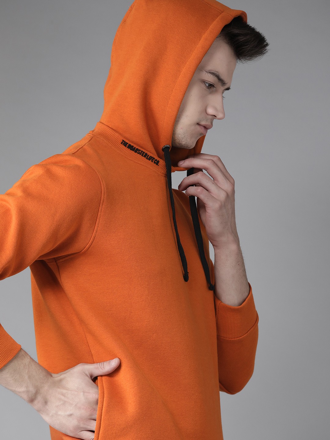 

Roadster Men Orange Solid Hooded Sweatshirt