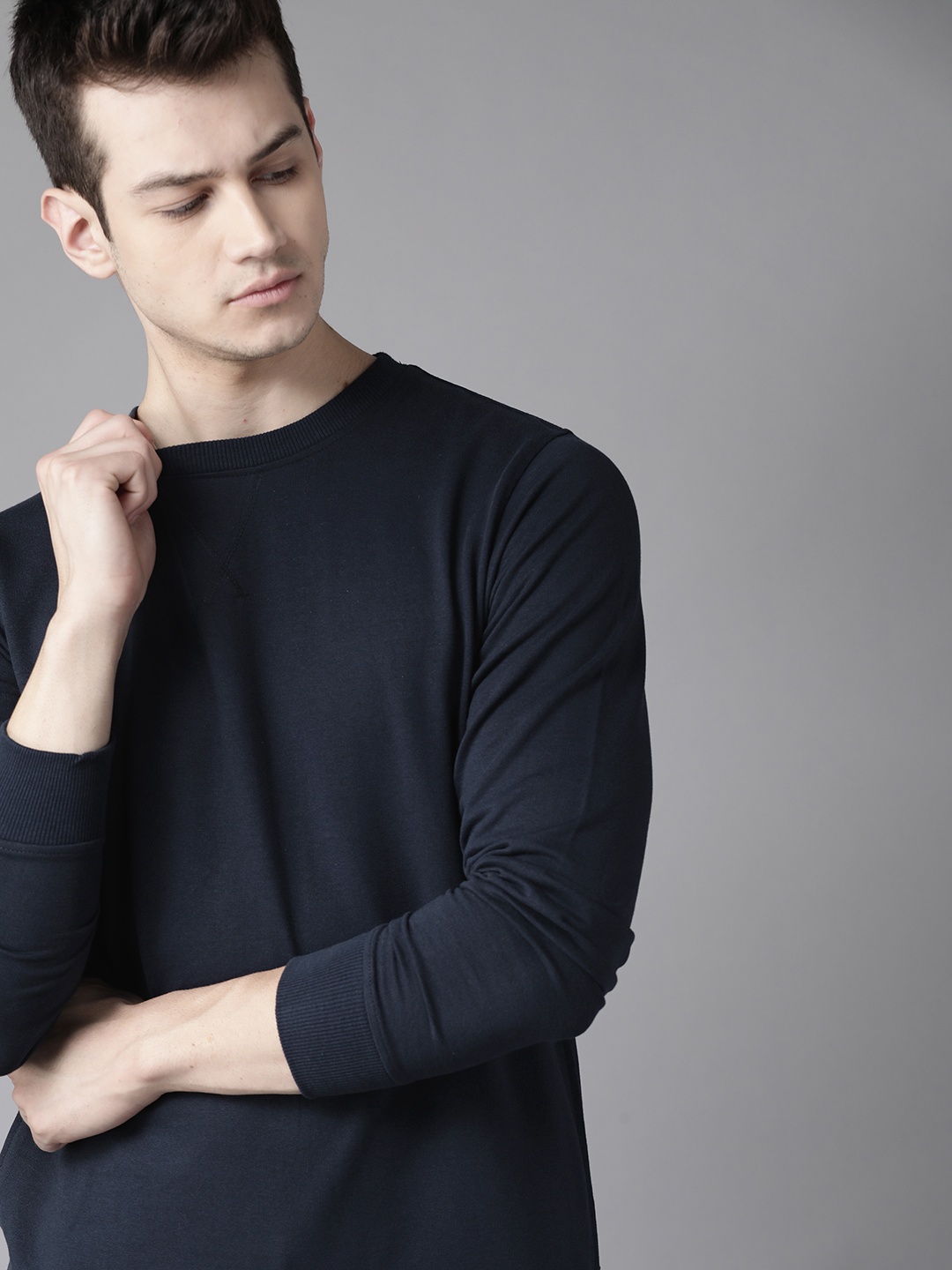 

Roadster Men Navy Blue Solid Sweatshirt