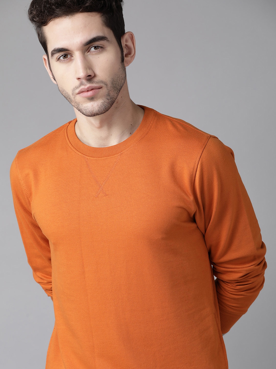 

Roadster Men Orange Solid Sweatshirt