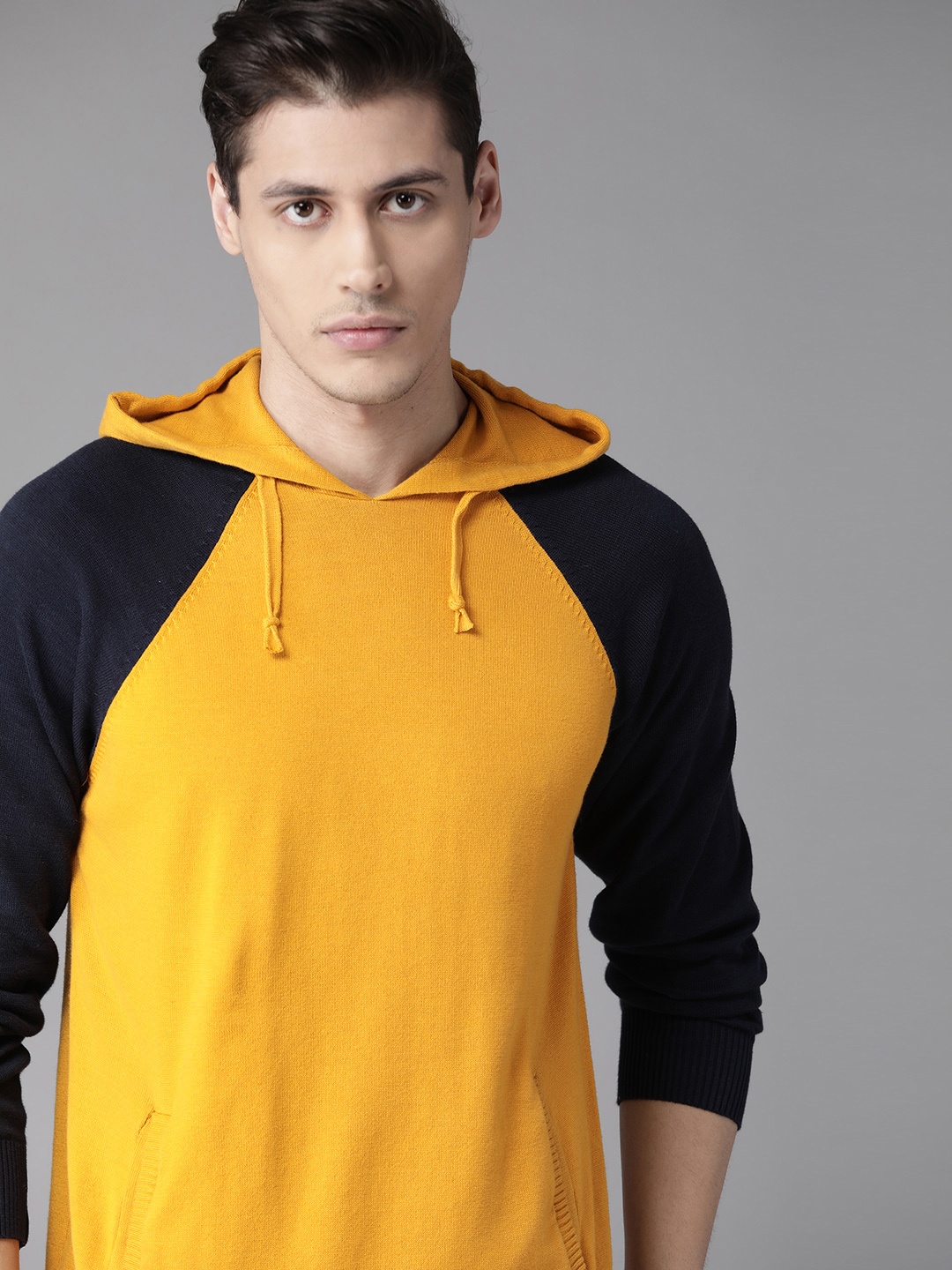 

Roadster Men Yellow & Navy Blue Solid Hooded Pullover