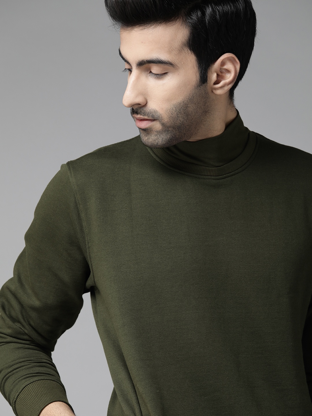 

Roadster Men Olive Green Solid Sweatshirt
