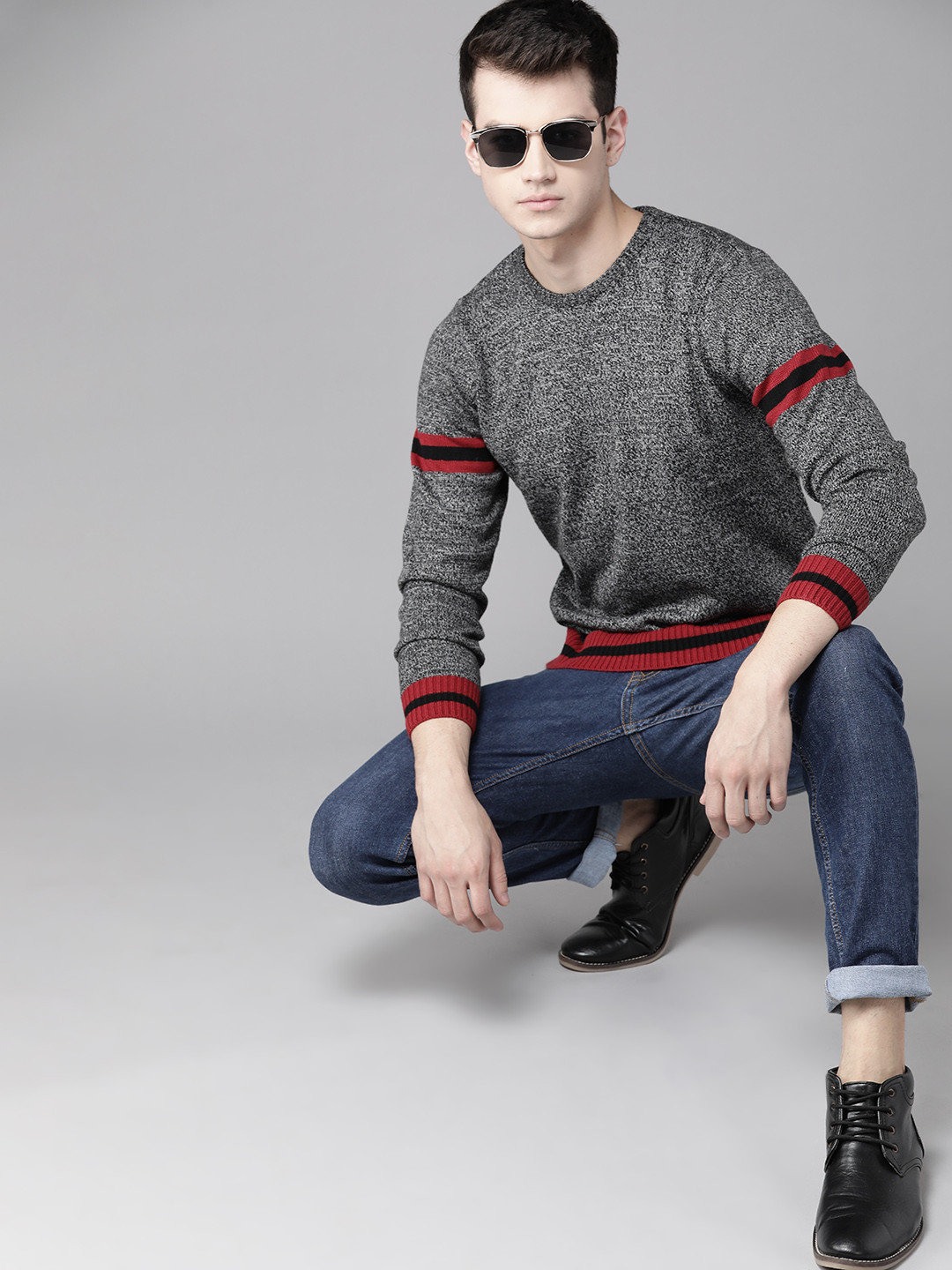 

Roadster Men Black & White Self Design Acrylic Sweater