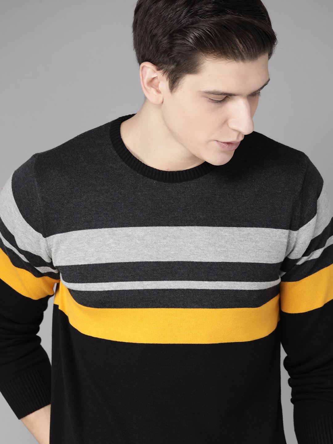 

Roadster Men Black & Yellow Striped Pullover Sweater