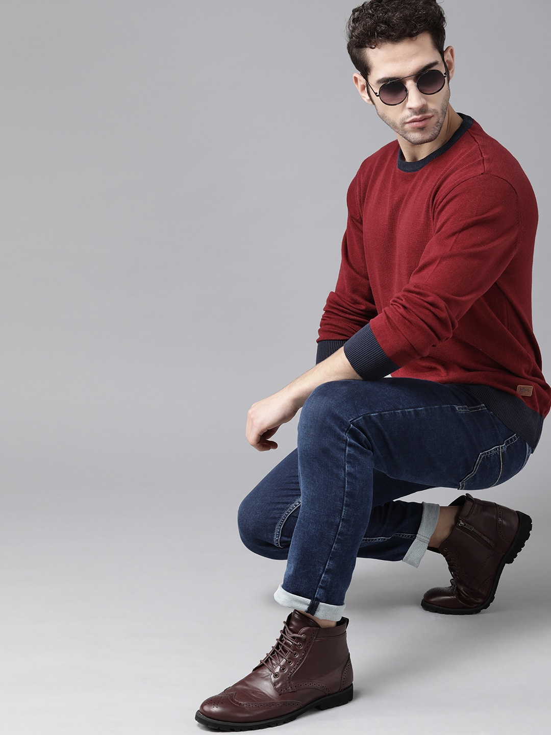

Roadster Men Maroon & Navy Blue Solid Pullover Sweater