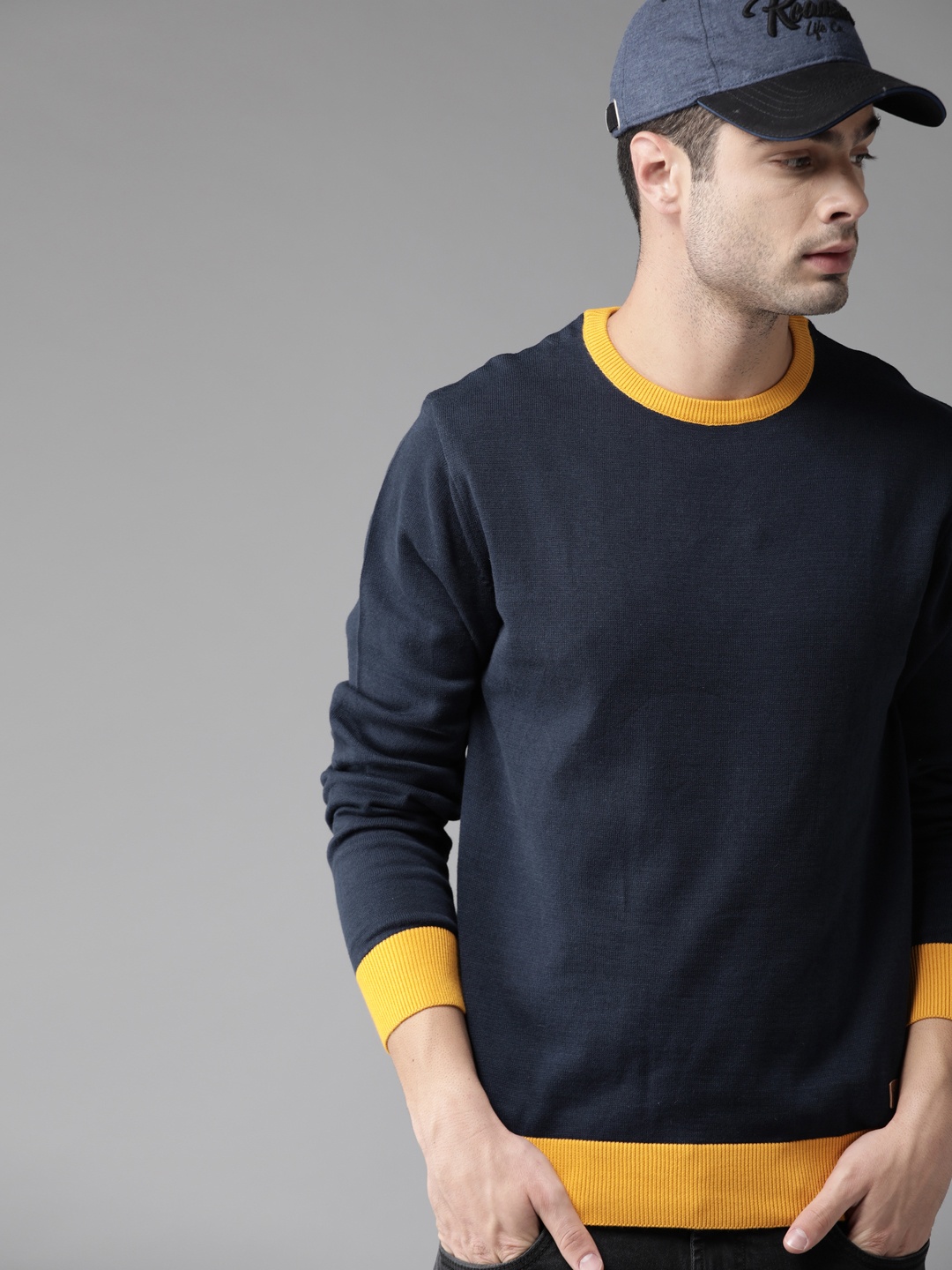 

Roadster Men Navy Blue Solid Pullover Sweater