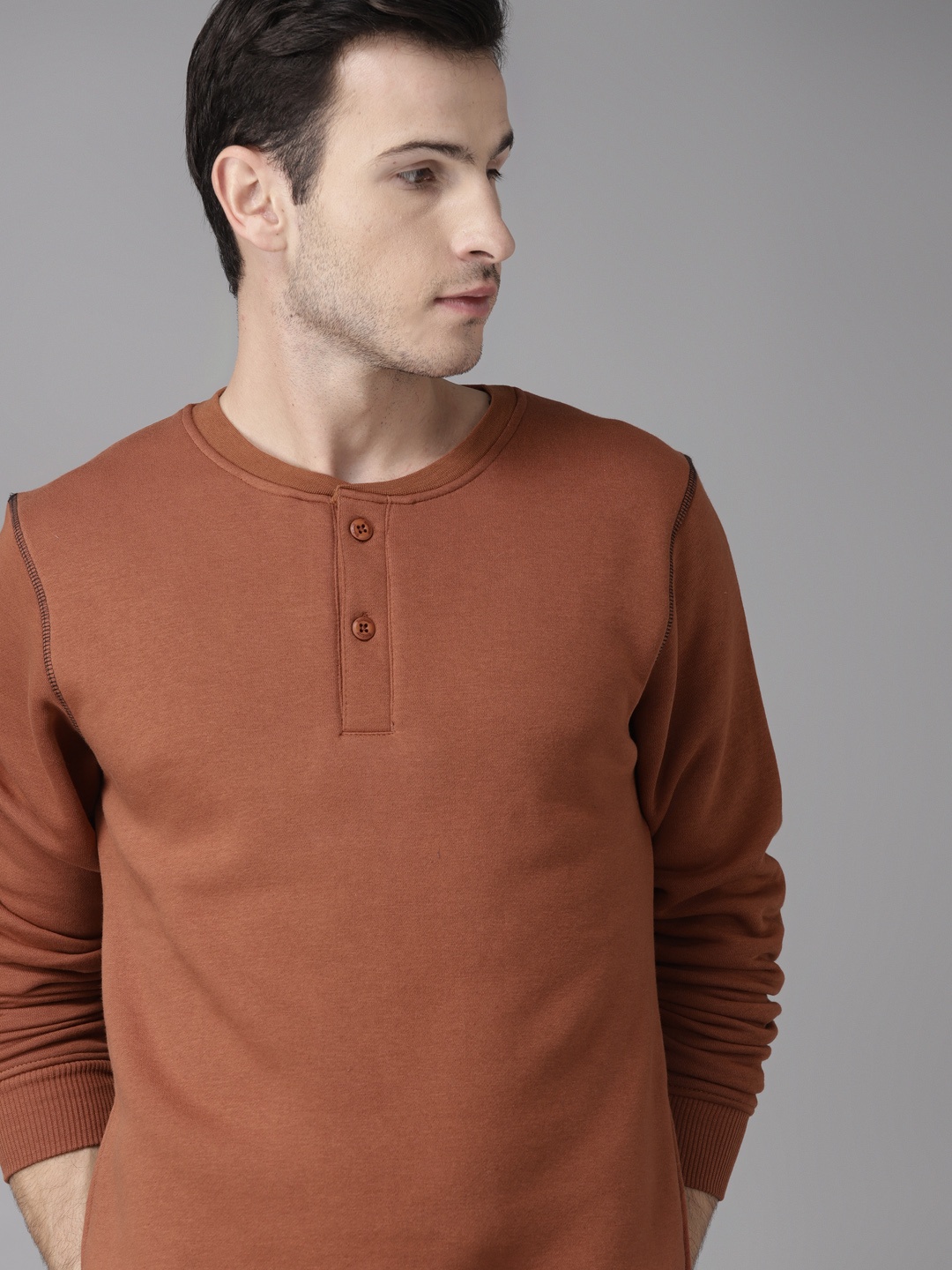 

Roadster Men Rust Orange Solid Sweatshirt