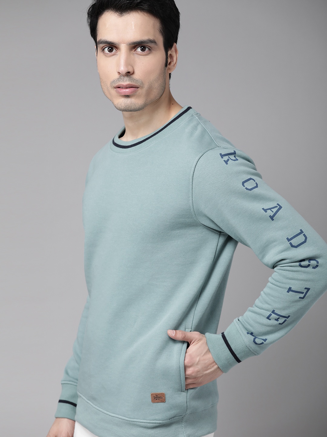 

Roadster Men Blue Solid Sweatshirt