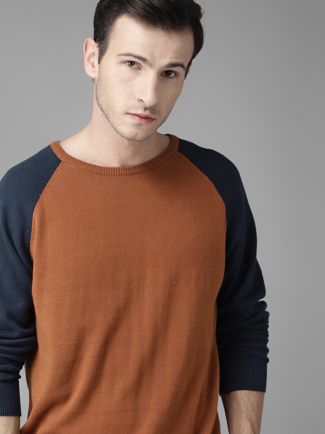 

Roadster Men Rust Brown & Navy Blue Solid Pullover Sweater