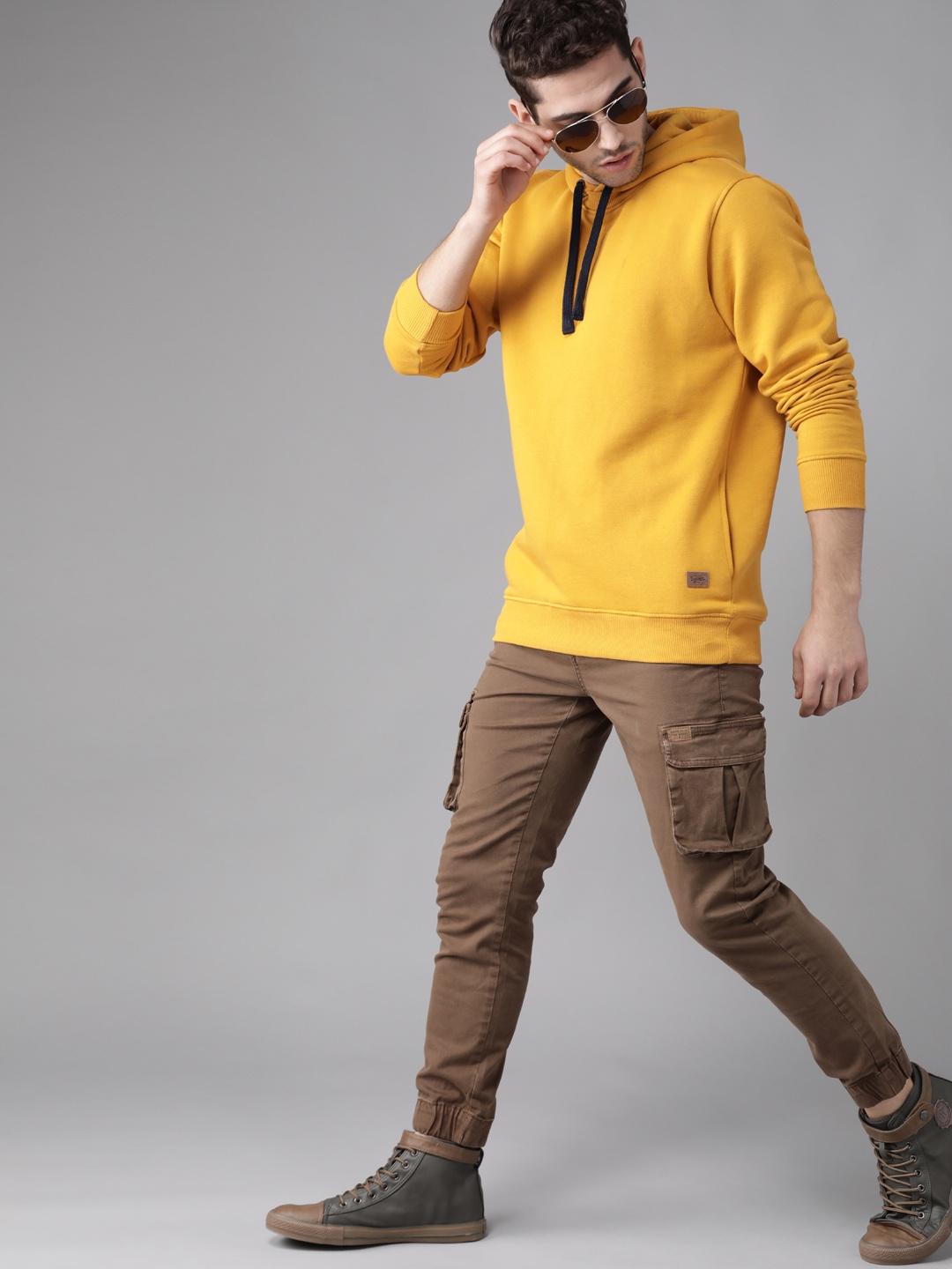 

Roadster Men Mustard Yellow Solid Hooded Sweatshirt