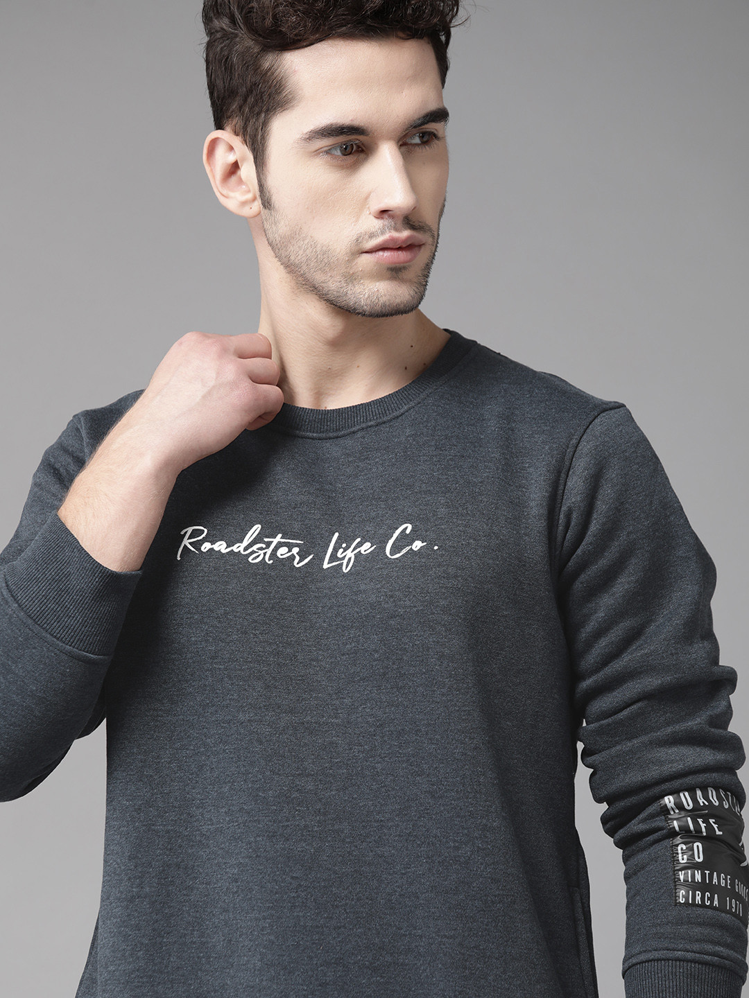 

Roadster Men Navy Blue Solid Sweatshirt