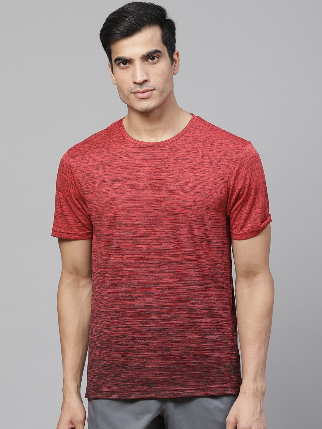 

Marks & Spencer Men Rust Red & Black Self-Design Round Neck Sports T-shirt
