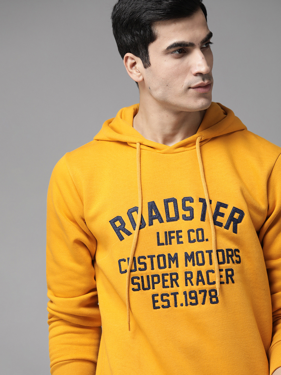 

Roadster Men Mustard Yellow & Navy Blue Self Design Hooded Sweatshirt