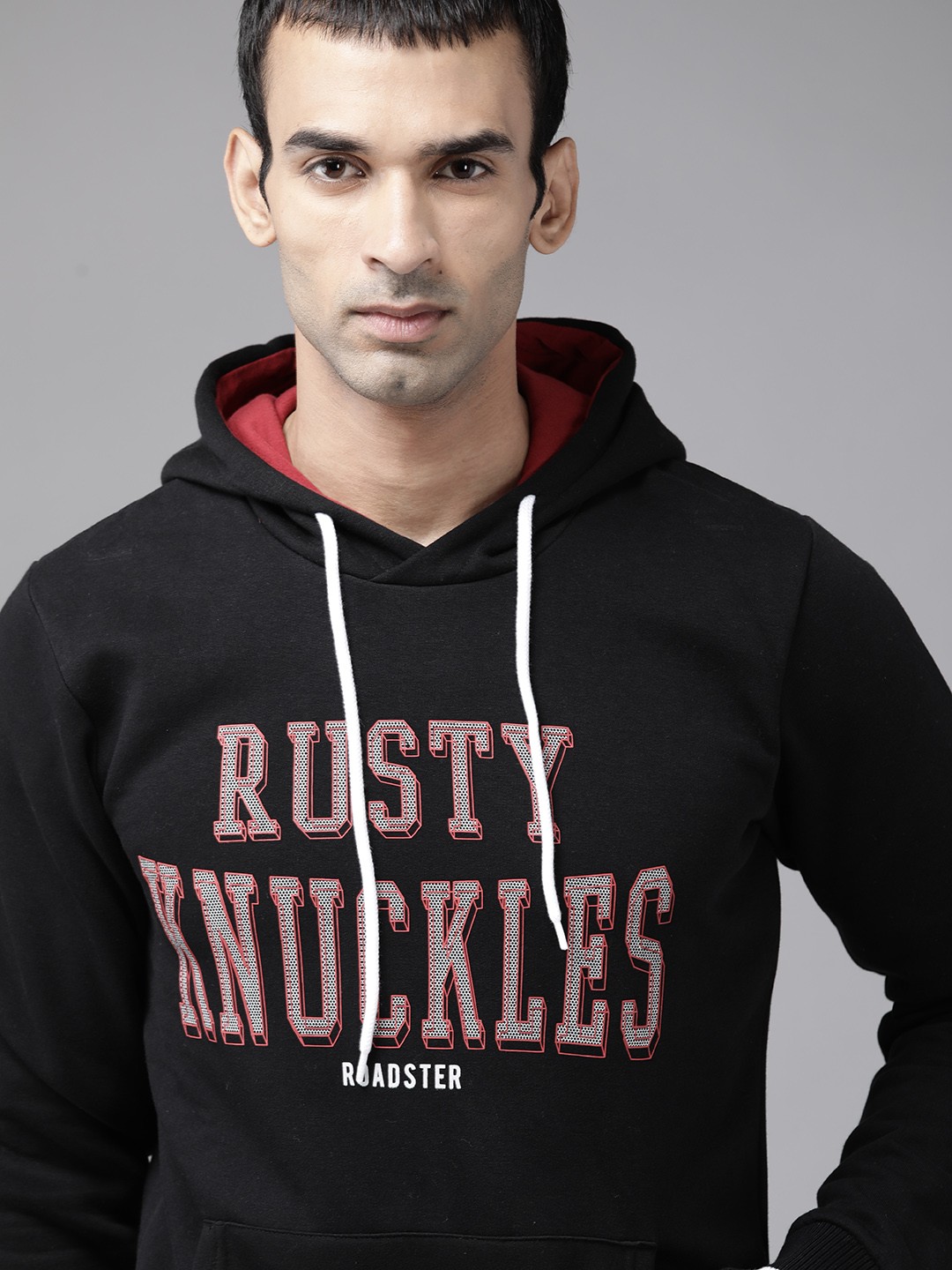 

Roadster Men Black & Red Rubber Print Hooded Sweatshirt