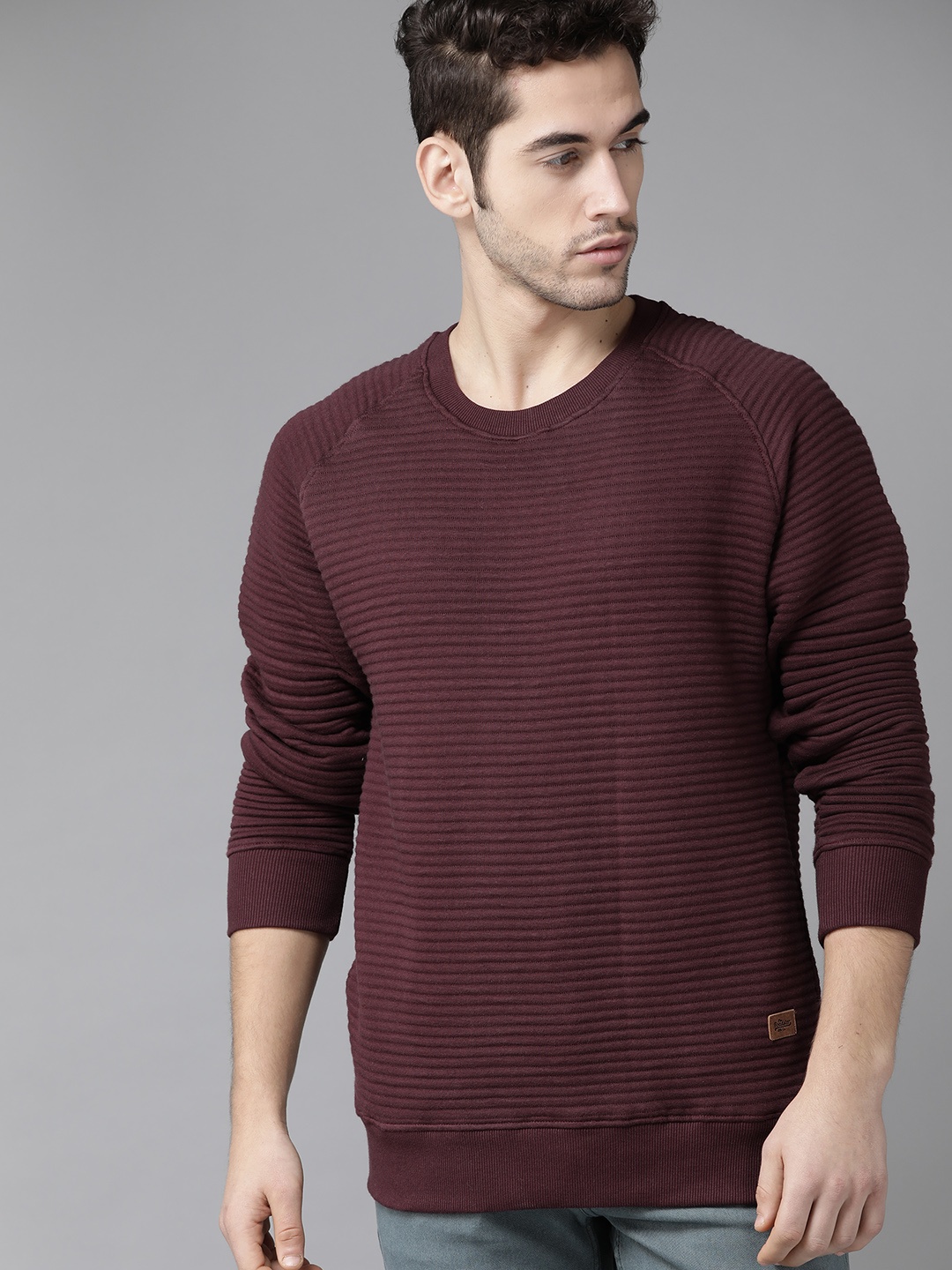 

Roadster Men Maroon Self-Striped Sweatshirt