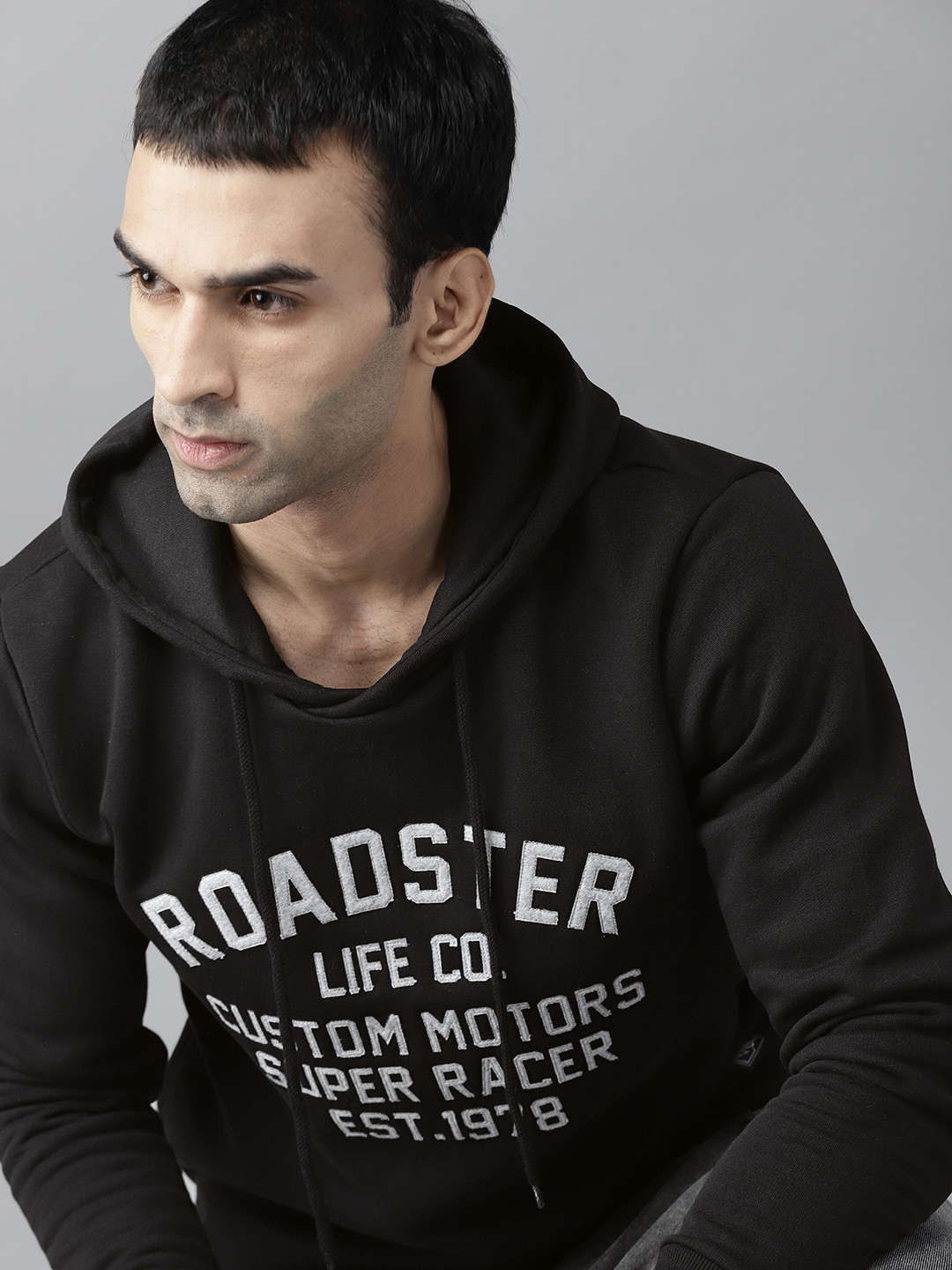 

Roadster Men Black Printed Hooded Sweatshirt