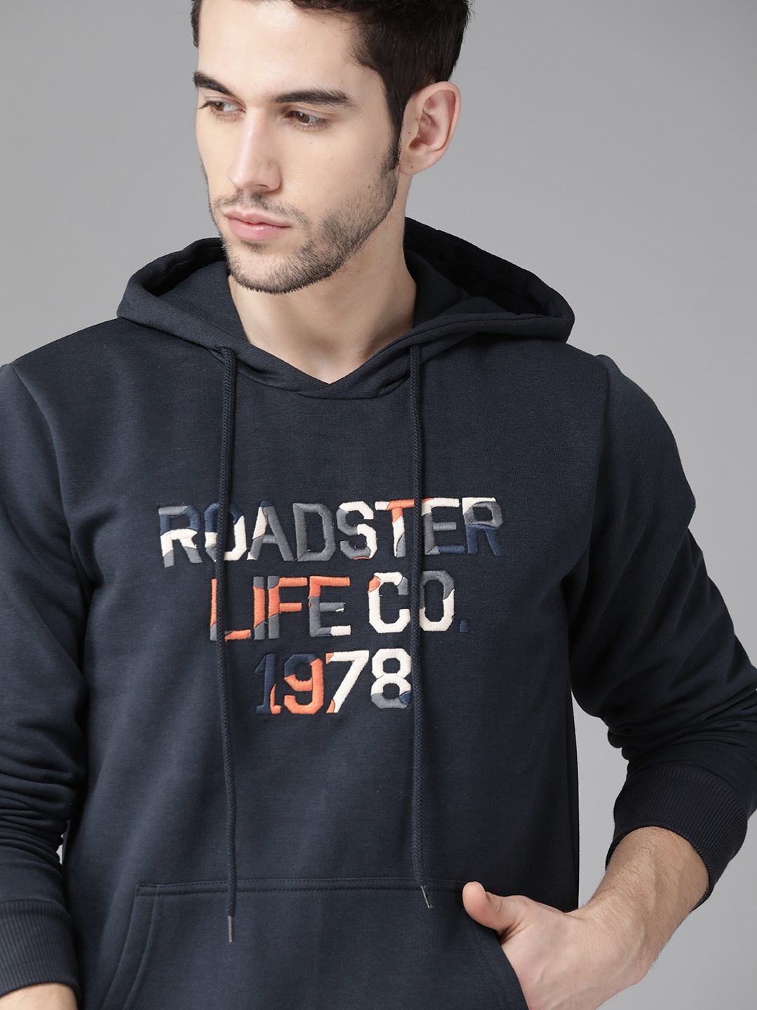 

Roadster Men Navy Blue Brand Logo Embroidered Hooded Sweatshirt