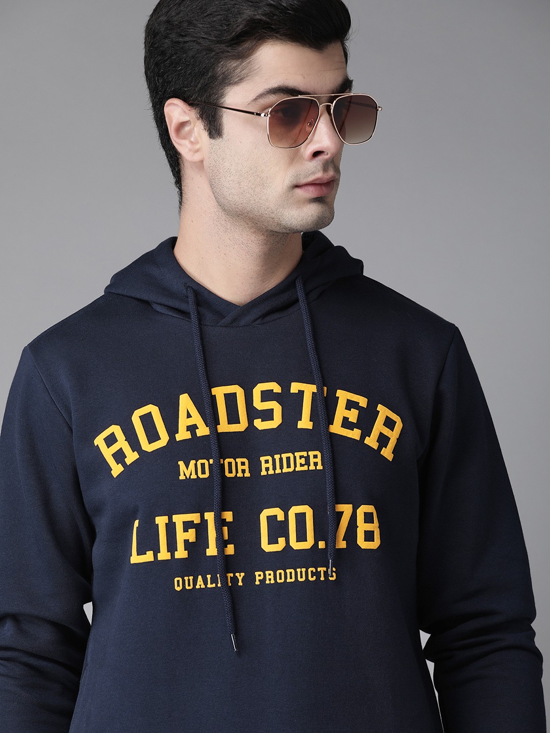 

Roadster Men Navy Blue & Mustard Yellow Brand Logo Print Hooded Sweatshirt
