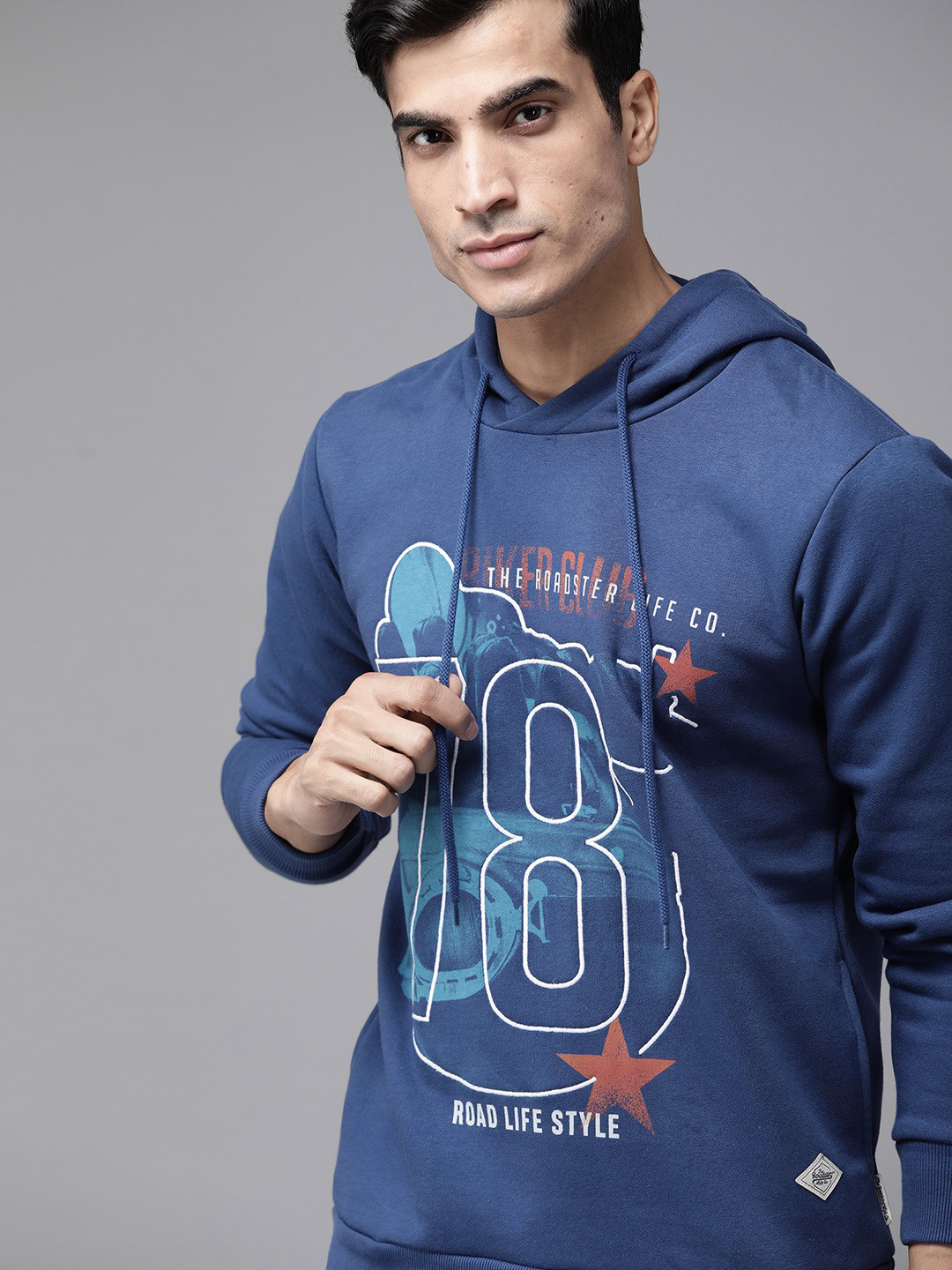 

Roadster Men Blue & White Printed Hooded Sweatshirt