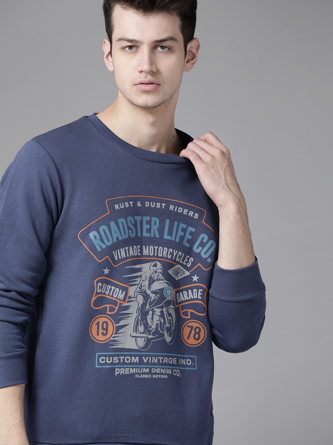 

Roadster Men Blue & Brown Printed Sweatshirt