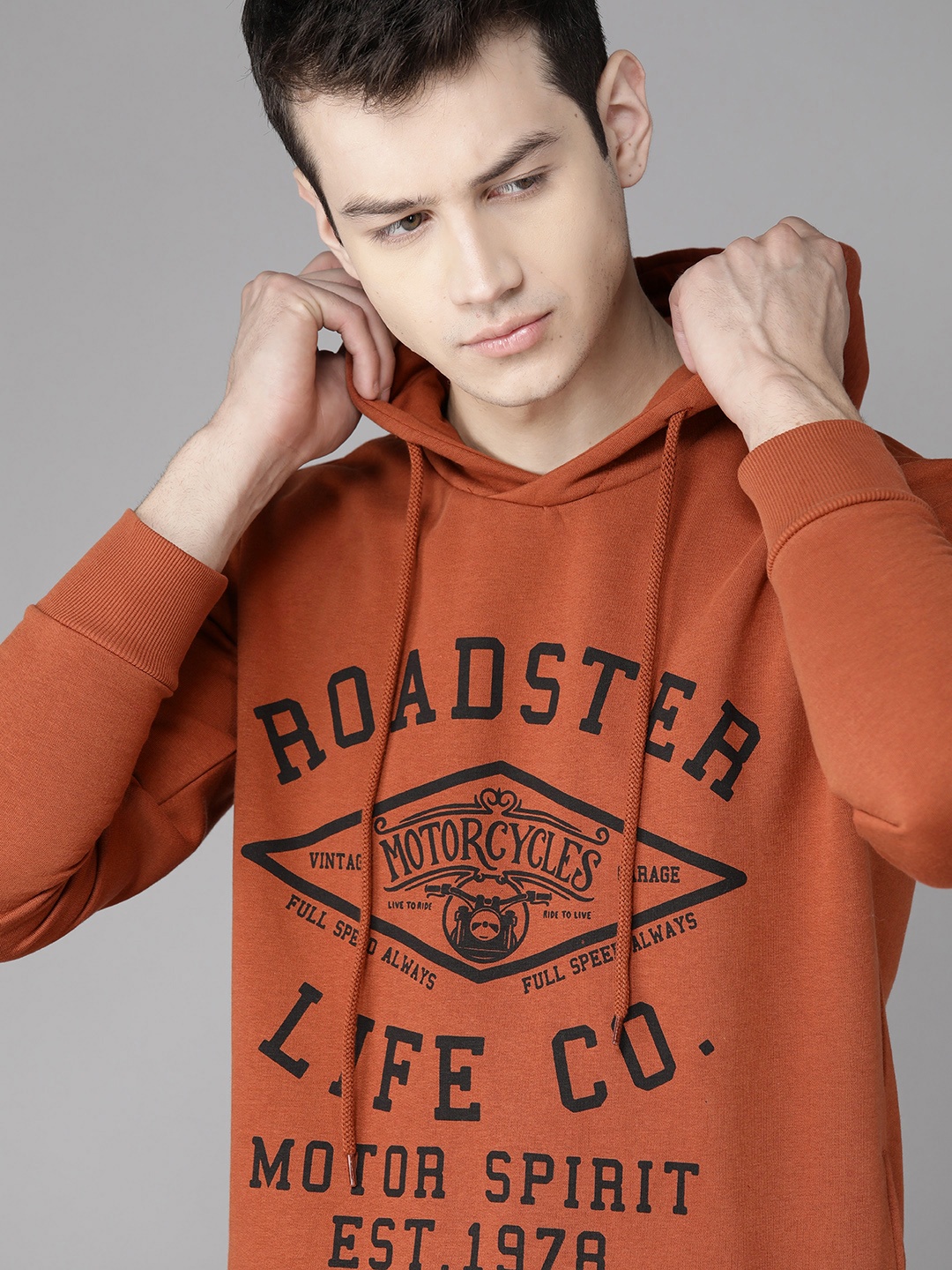 

Roadster Men Rust Orange & Black Printed Hooded Sweatshirt