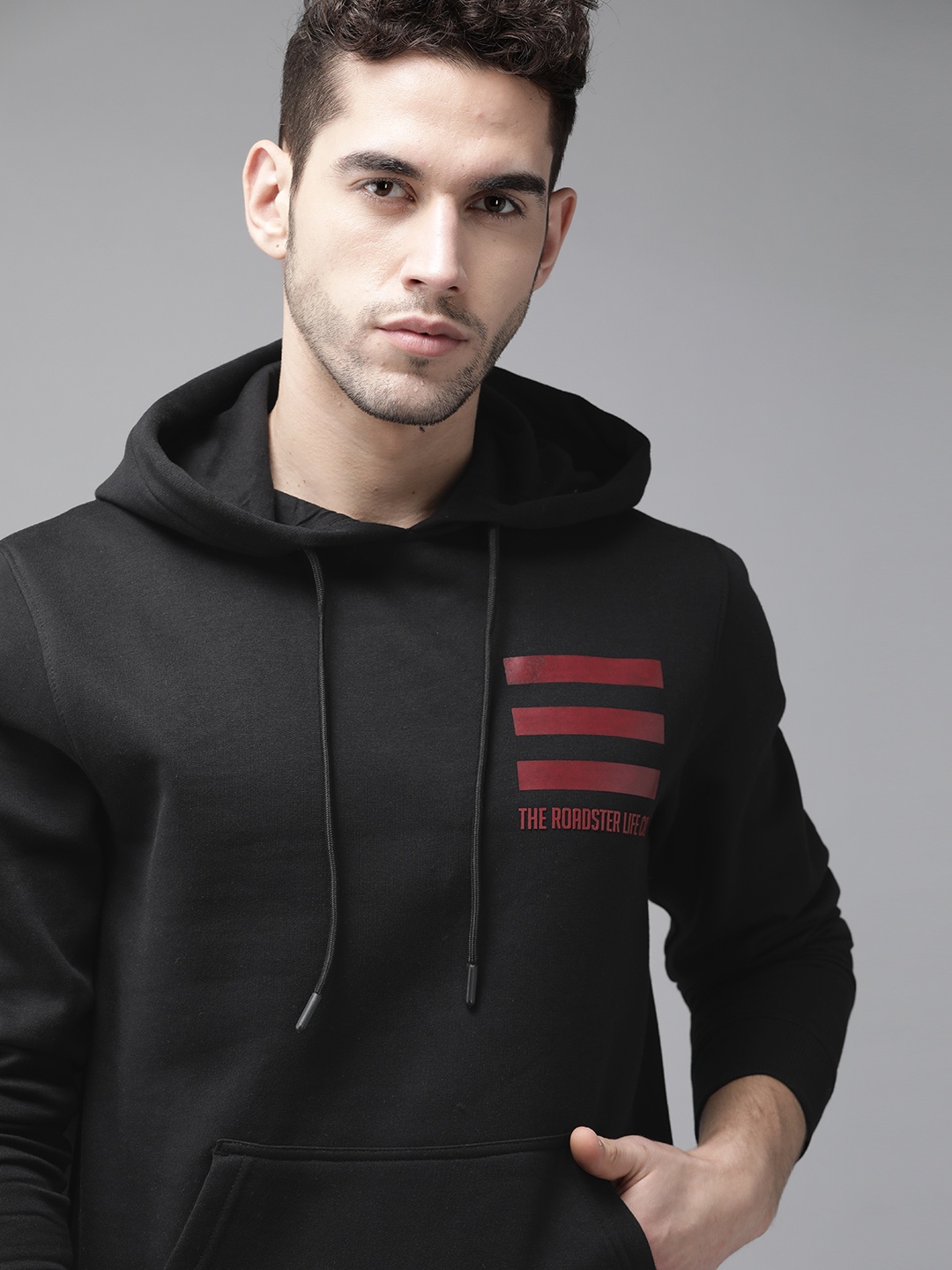 

Roadster Men Black Solid Hooded Sweatshirt with Printed Detail