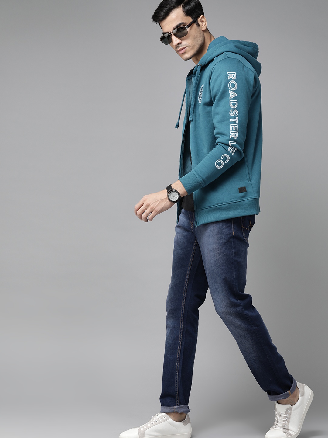 

Roadster Men Teal Blue Solid Hooded Sweatshirt