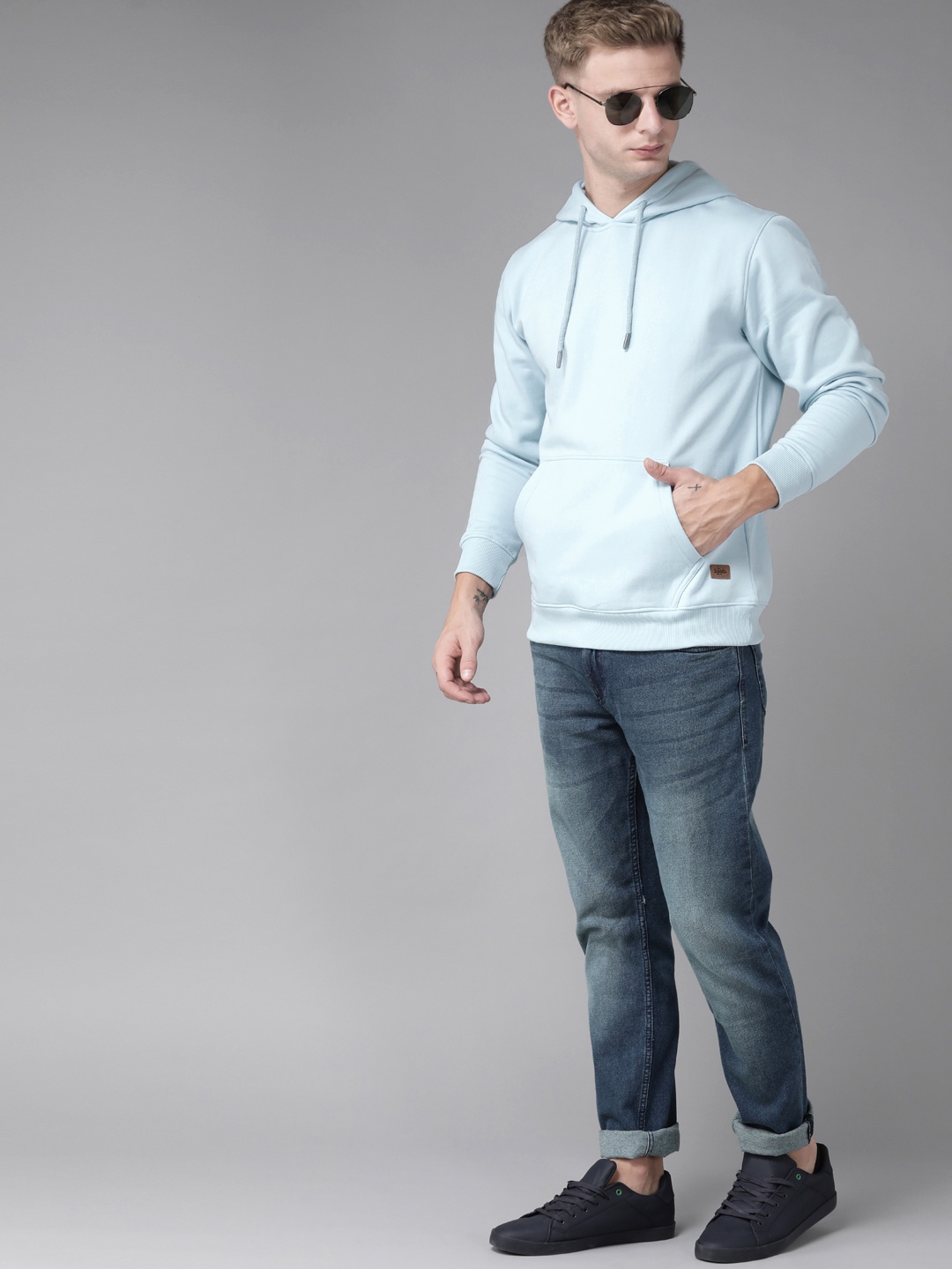 

Roadster Men Blue Solid Hooded Sweatshirt