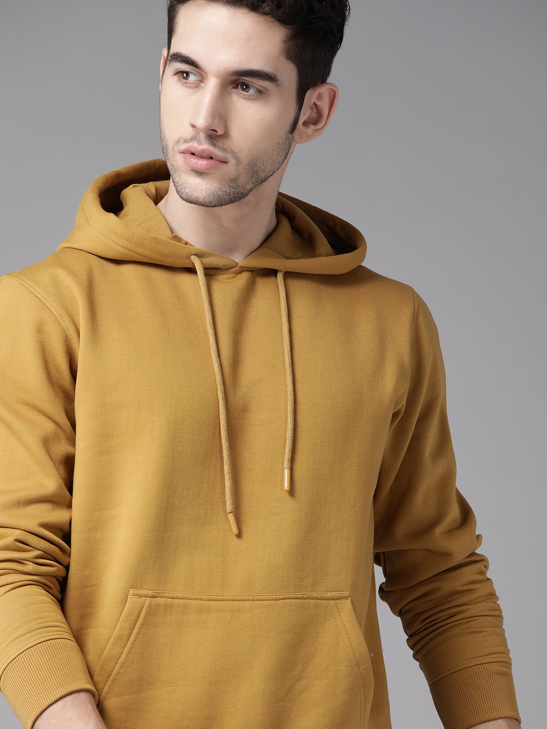 

Roadster Men Mustard Yellow Solid Hooded Sweatshirt