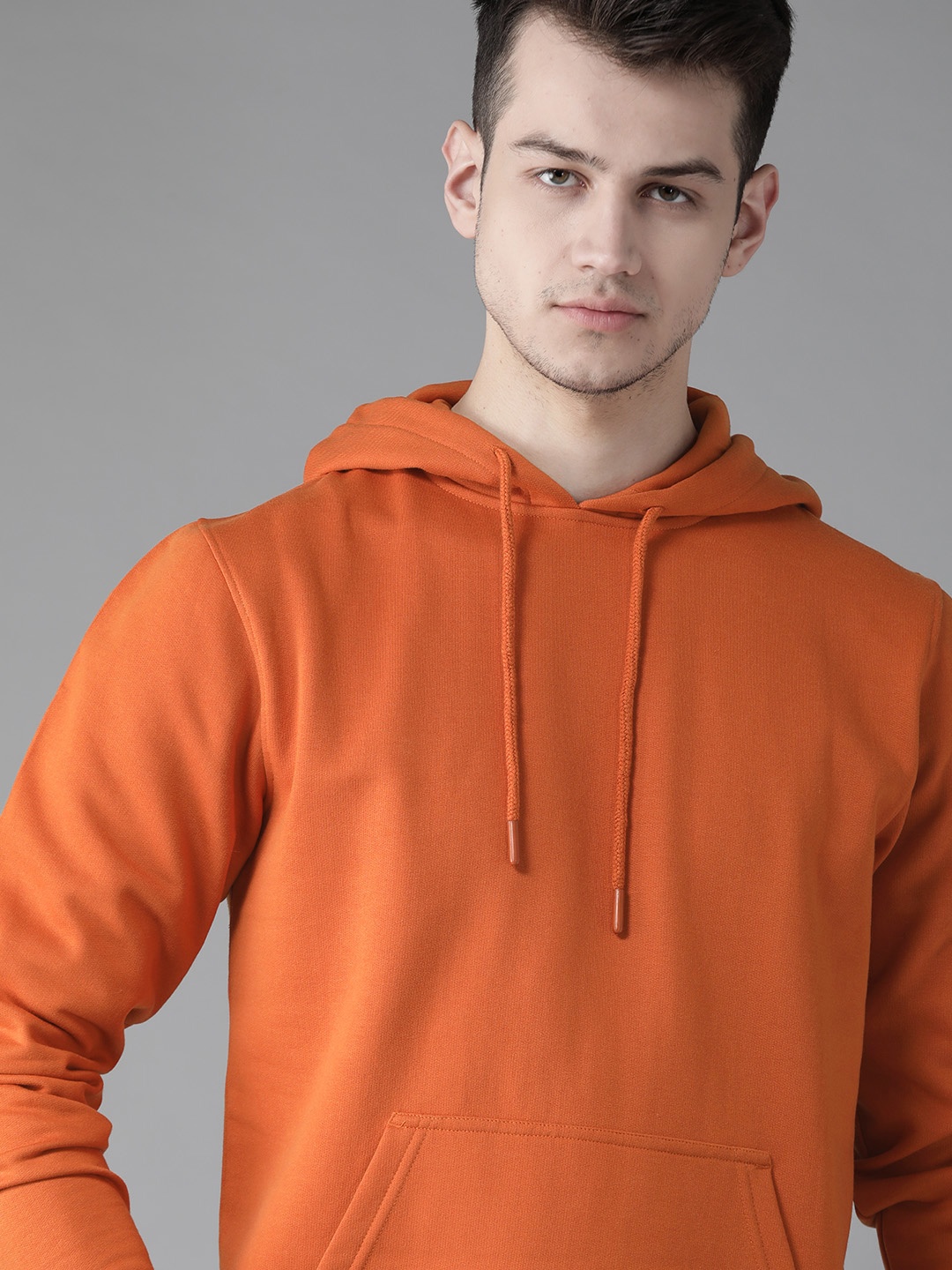 

Roadster Men Orange Solid Hooded Sweatshirt