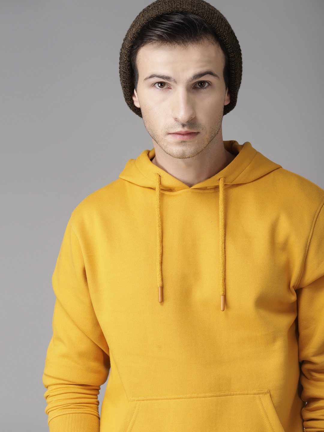 

Roadster Men Mustard Yellow Solid Hooded Sweatshirt