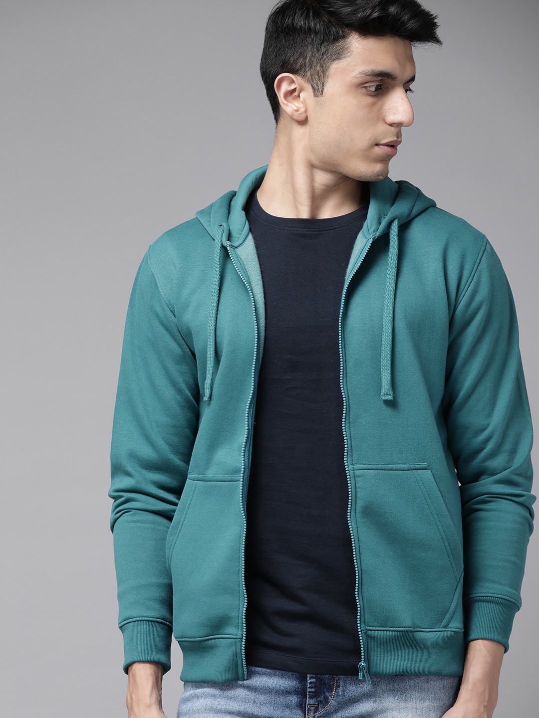 

Roadster Men Teal Green Solid Hooded Sweatshirt