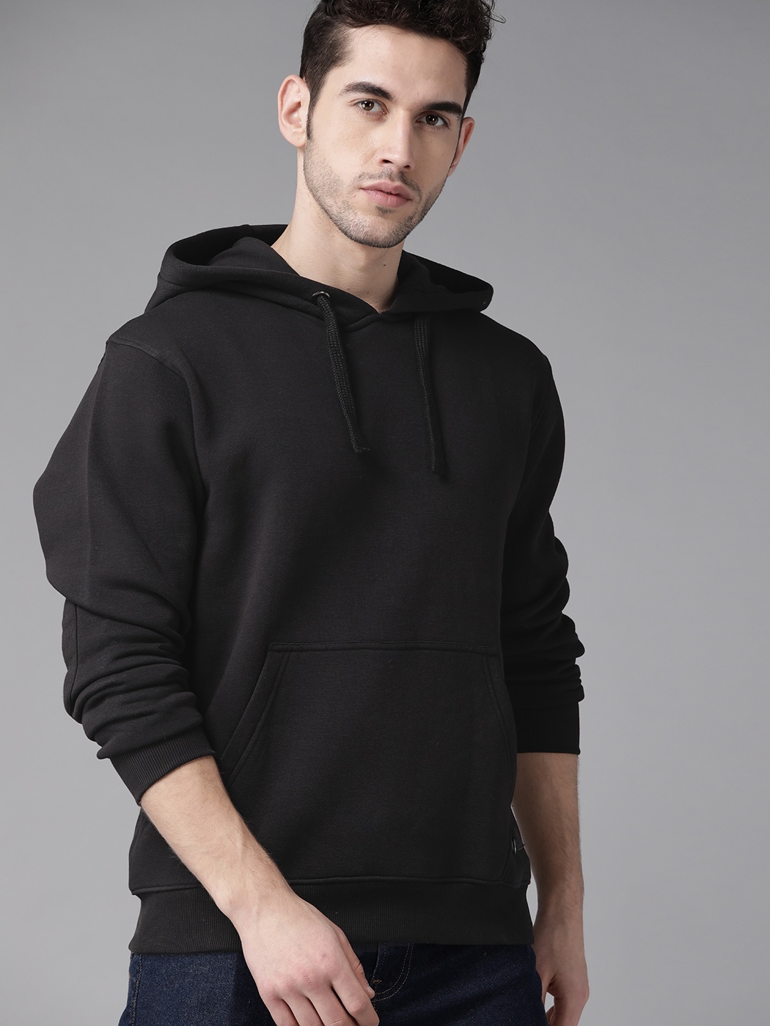 

Roadster Men Black Solid Hooded Sweatshirt