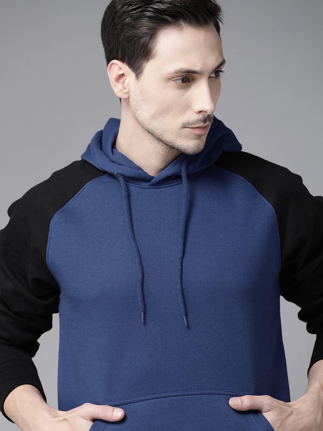 

Roadster Men Navy Blue & Black Solid Hooded Pullover Sweatshirt